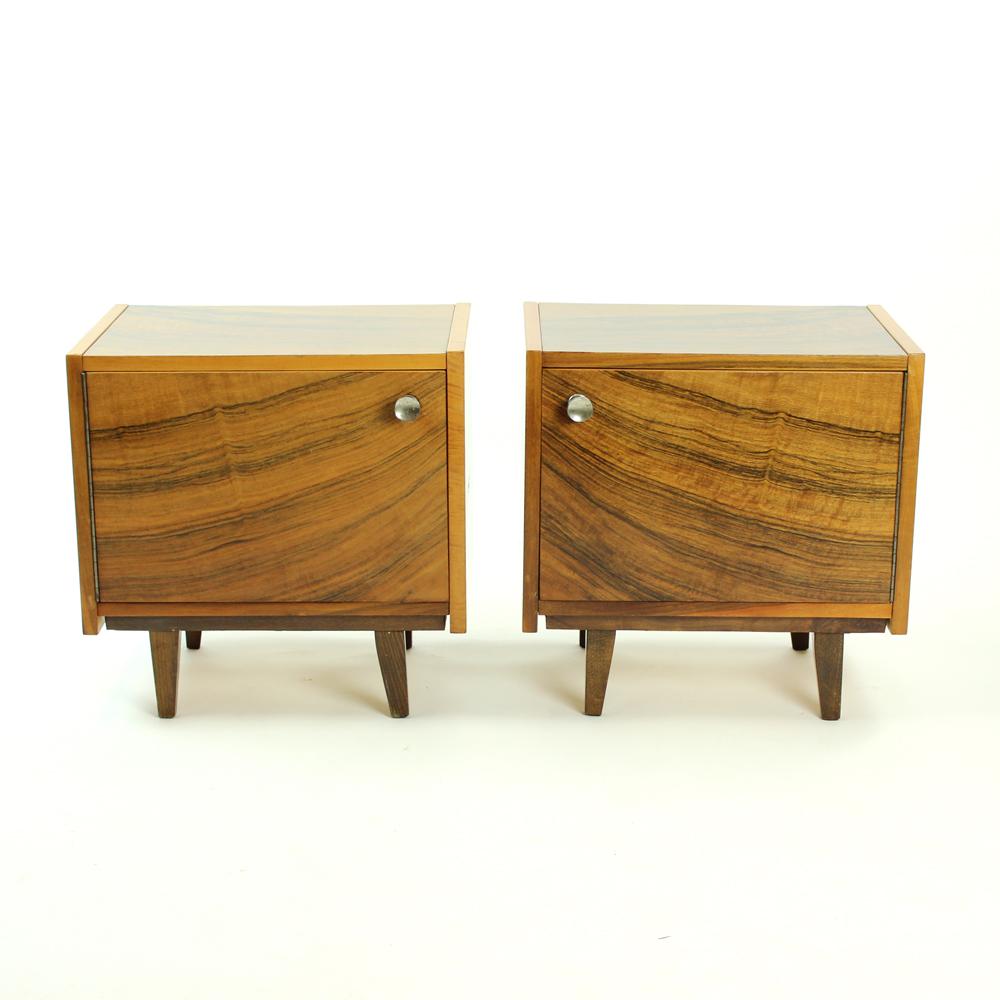 Pair of bedside tables that look just amazing! Made in a cubical shape with walnut veneer. Produced in Czechoslovakia in 1970s by a National Furniture Company in Topolcany. The tables were kept in great condition as they are still untouched but