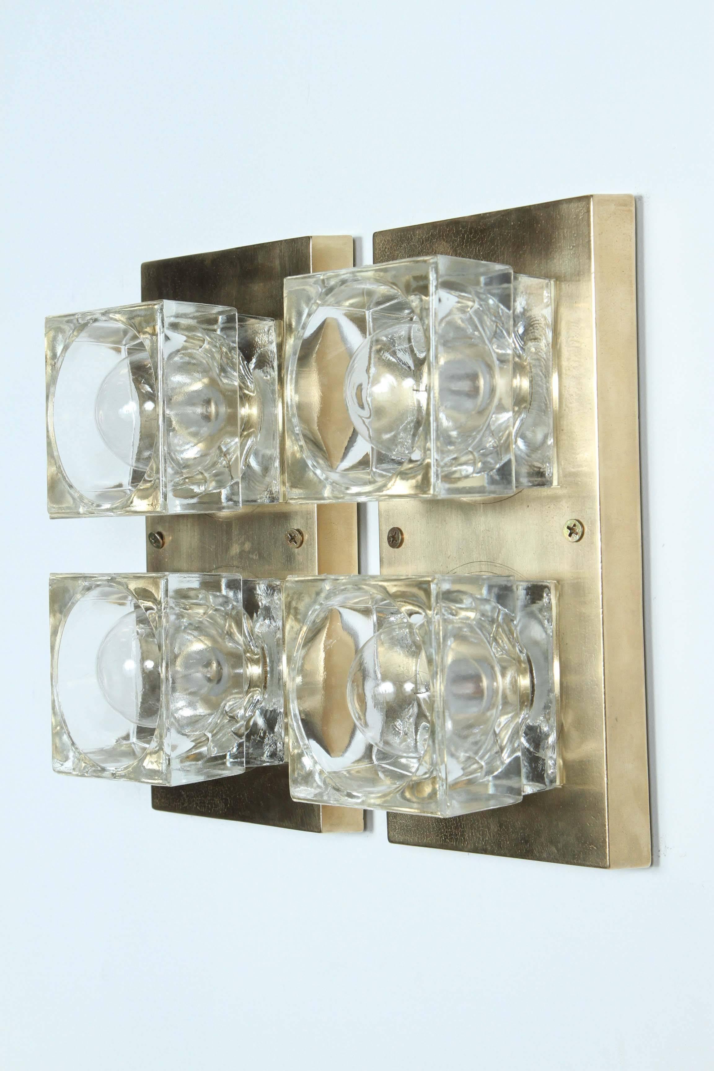 Pair of brass and glass sconces by Sciolari.
The rectangle brass plates each support two glass cube blocks, and they have been newly rewired.
  