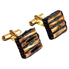 Paire de boutons de manchette par Line Vautrin, vers 1960