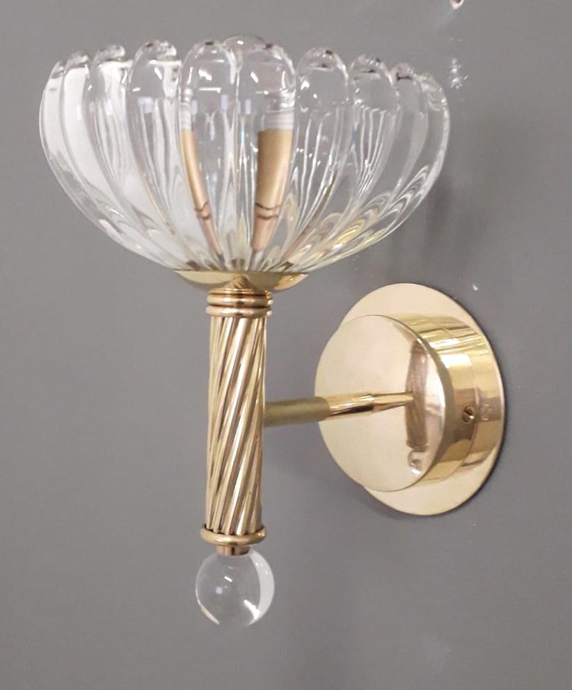 Vintage Italian wall lights with hand blown Murano glass cups mounted on brass frames, made in Italy by Barovier e Toso, circa 1950s
Original mark on the backplate
Measures: Height 10 inches, width 7 inches, depth 8 inches, backplate diameter 4.7