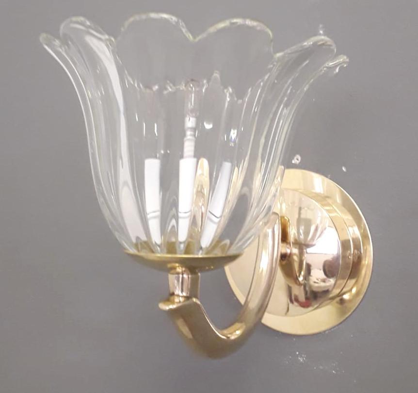 Vintage Italian wall lights with hand blown Murano glass cups mounted on brass frames / Made in Italy by Barovier e Toso, circa 1950s
Original mark on the backplate
Measures: Height 7 inches, width 7 inches, depth 9.5 inches, backplate diameter 4.7
