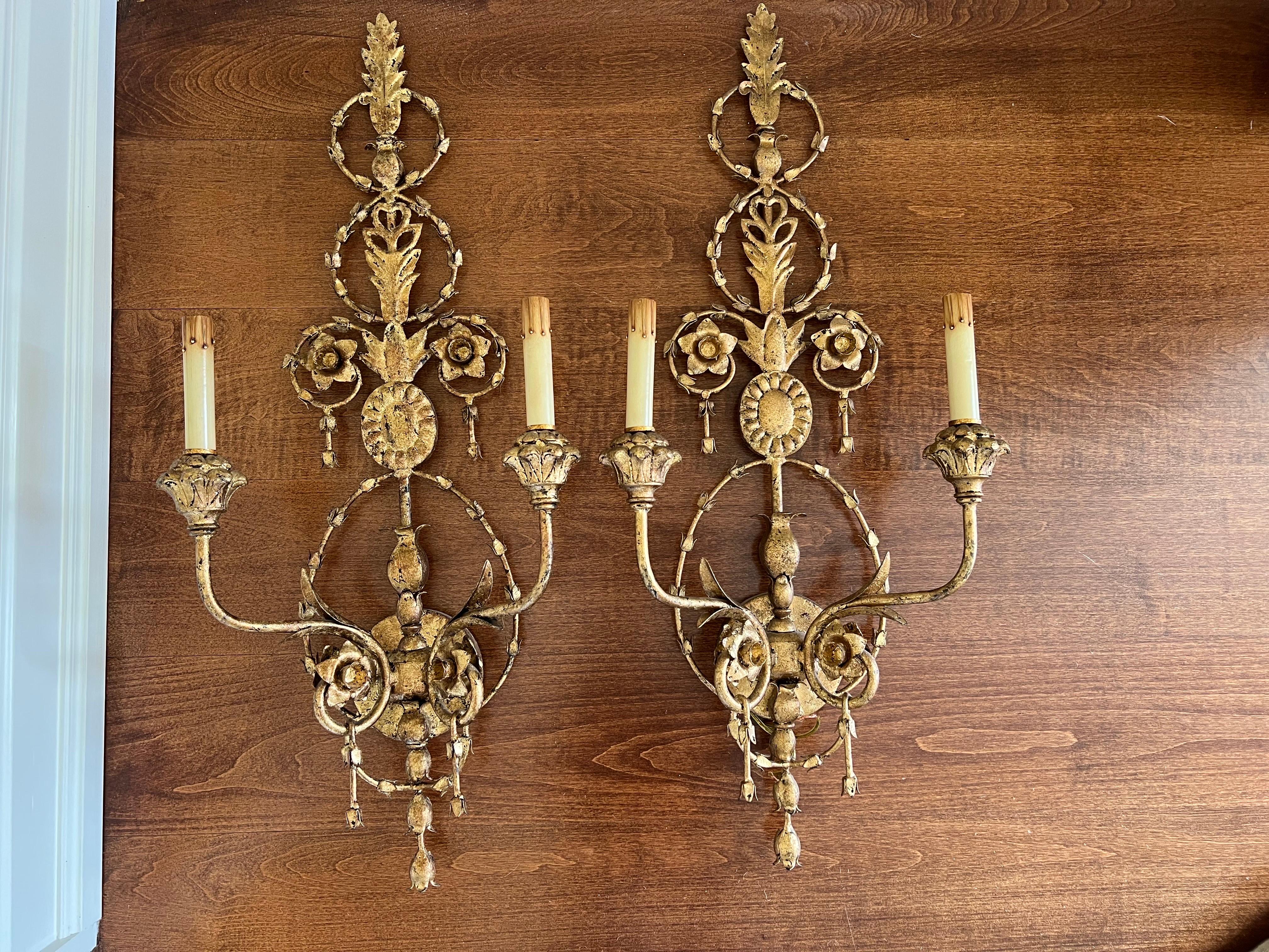 Pair of Currey and Company neoclassical style gilt sconces. The Lillian August Collection from Currey and Company . Signature look and timeless design. Necolassical traditional gilt metal sconces in a gold leaf finish. These do not come with shades.