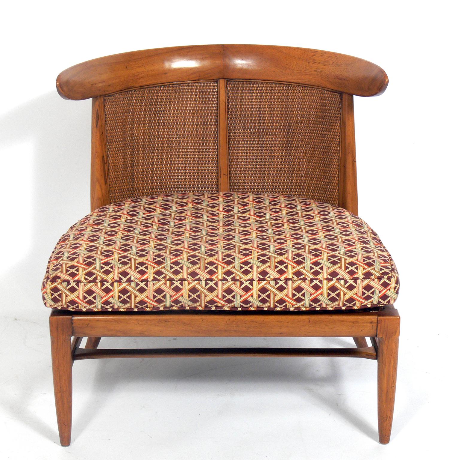 Pair of curvaceous caned back slipper chairs, designed by John Lubberts and Lambert Mulder for Tomlinson, American, circa 1950s. Designed for Tomlinson's 