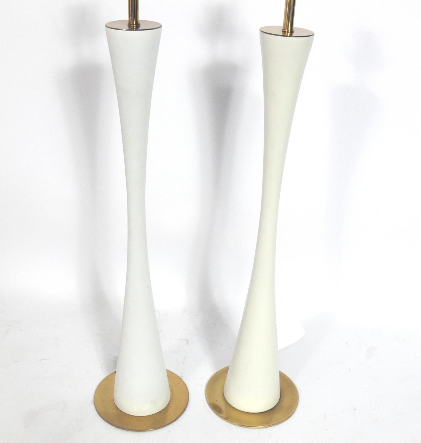 Pair of curvaceous lamps, designed by Stewart Ross James for Hansen, American, circa 1960s. They have been rewired and are ready to use. The price noted below includes the shades.