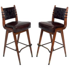 Pair of Curvaceous Oak Leather and Brass Bar Stools