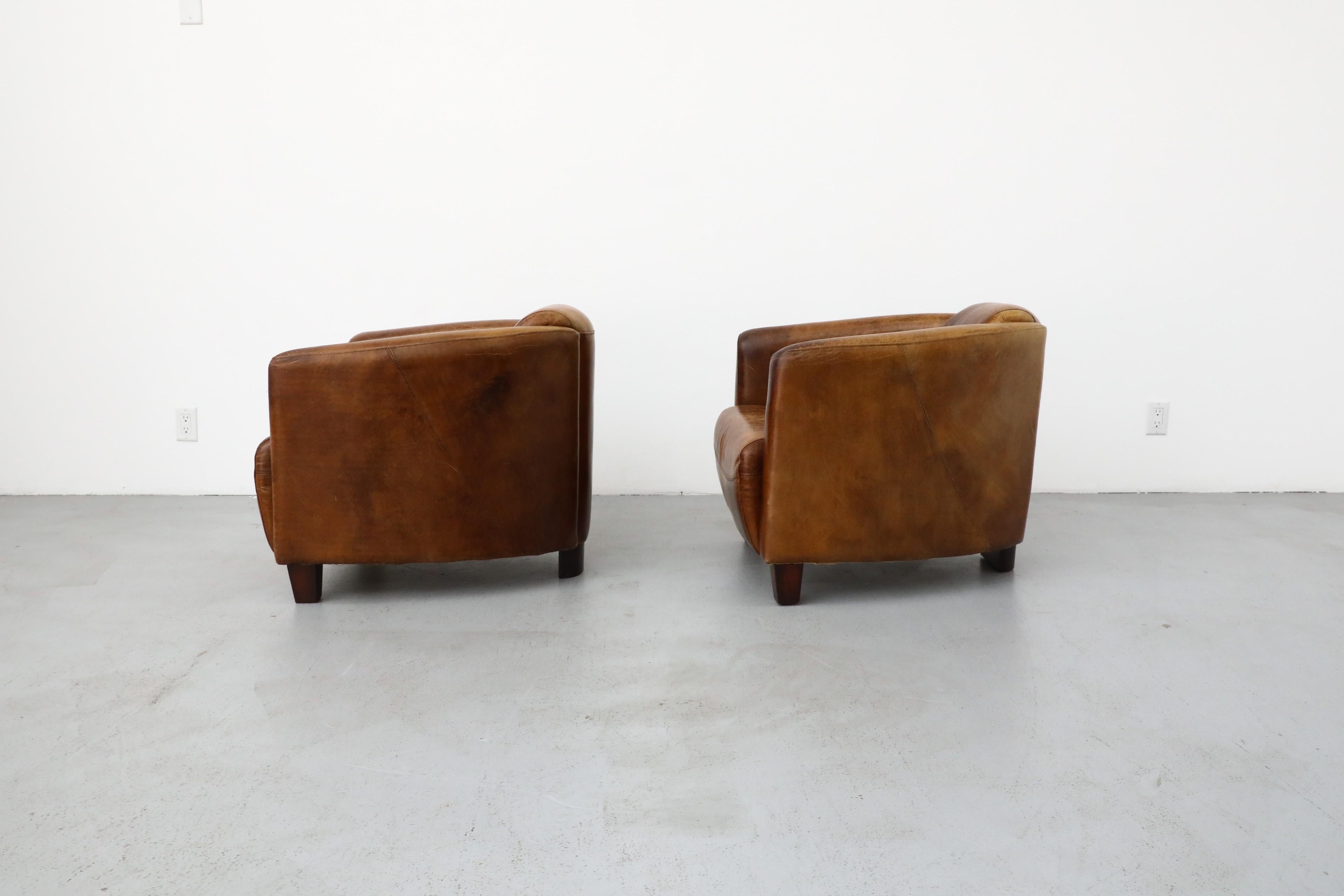 Pair of Curved Aviator Model Brown Leather Lounge Chairs In Good Condition In Los Angeles, CA