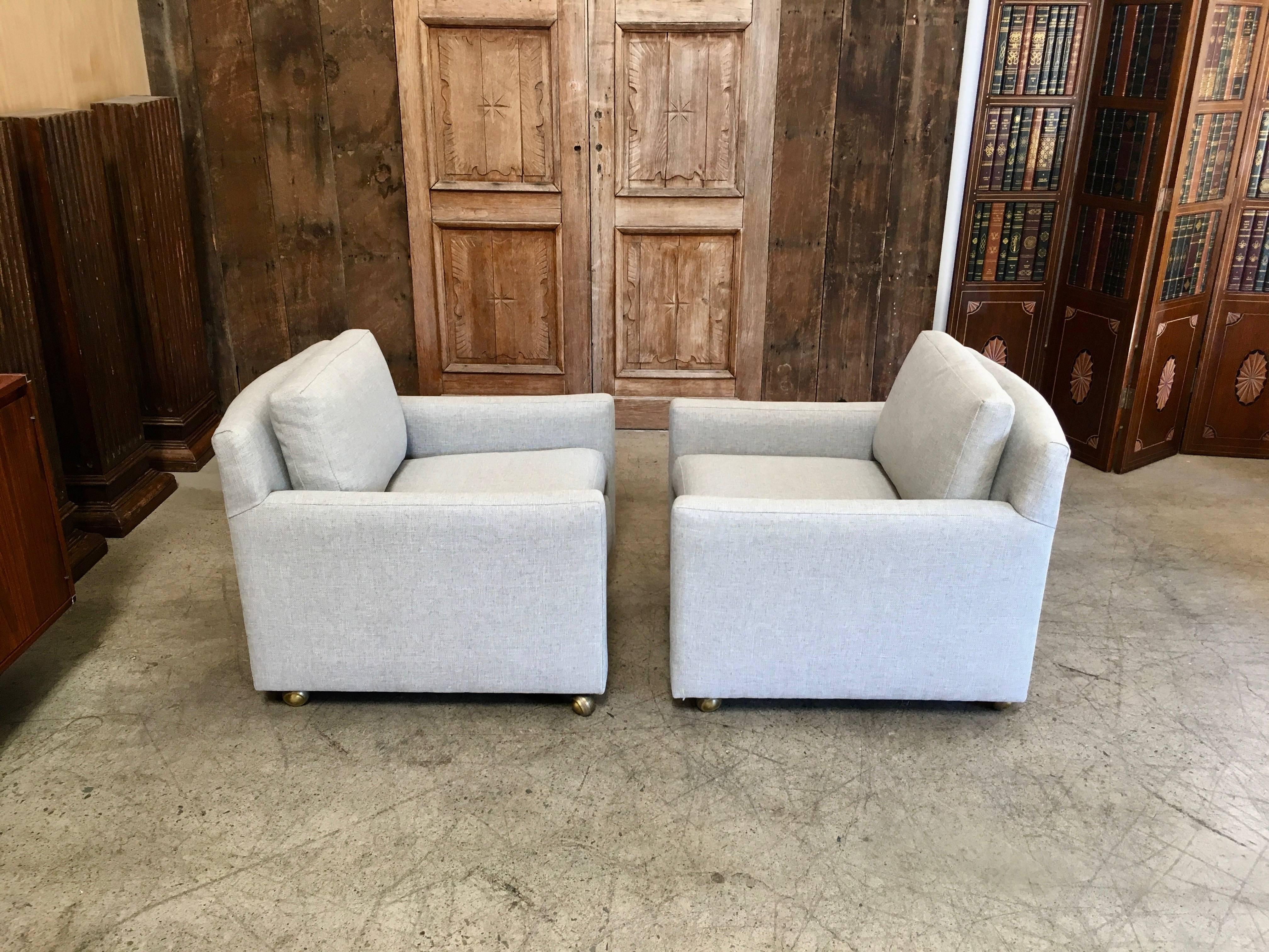 Pair of Curved Back 1950s Lounge Chairs on Casters 2