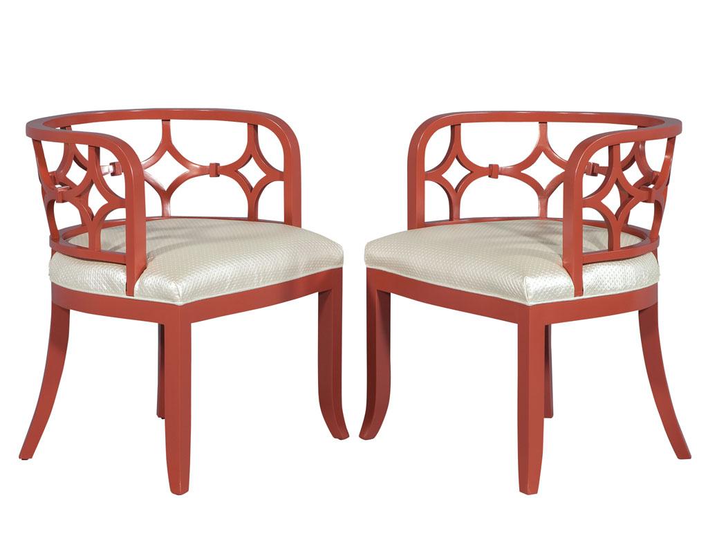 Pair of curved back scrolled patterned lounge chairs finished and upholstered by Carrocel, these chairs have a contemporary yet classic design, the frames are made in Italy, and composed of solid beech wood.