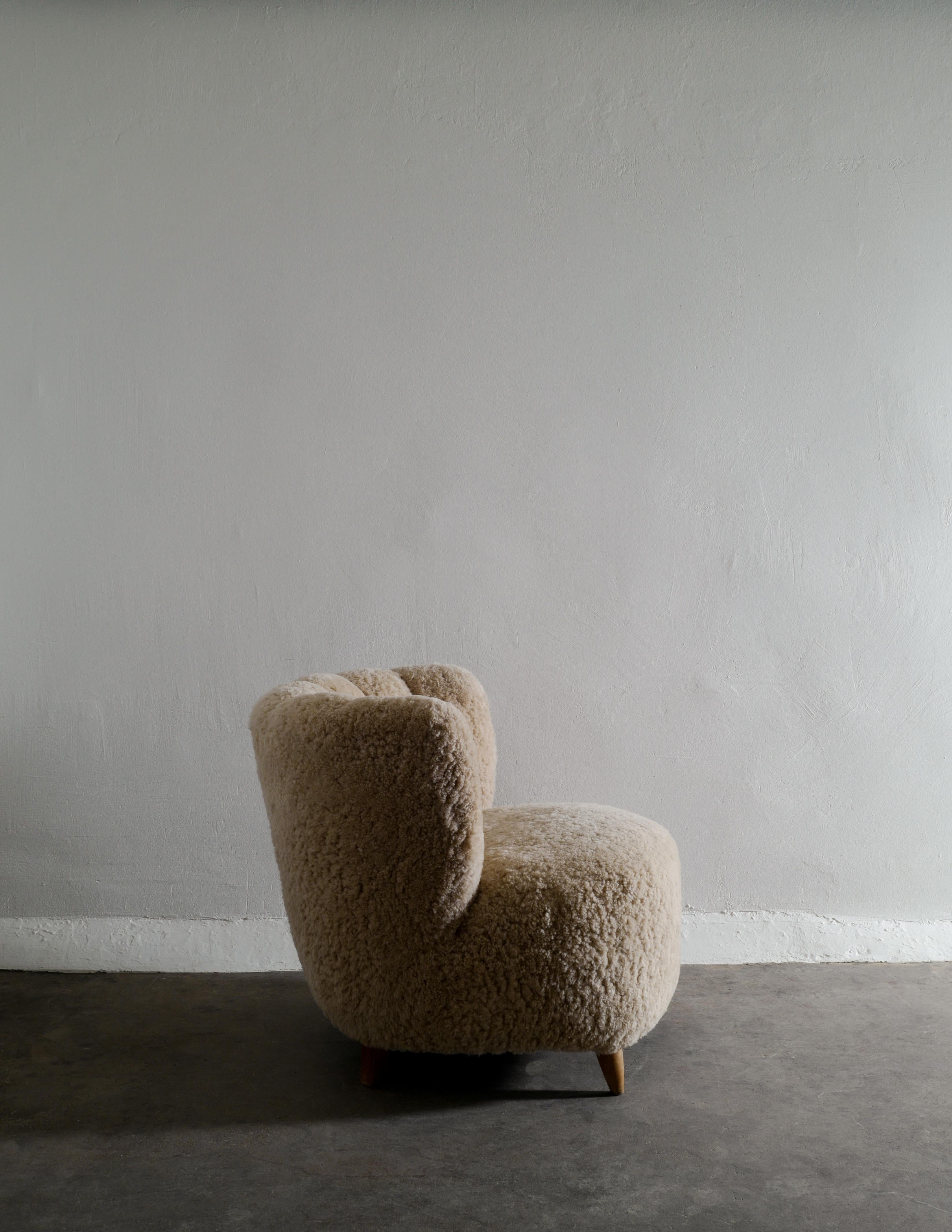 Pair of Curved Danish Easy Lounge Chairs in Sheepskin Produced in Denmark 1940s 1