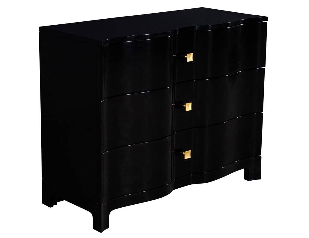 Pair of curved front black lacquered chests night tables. Three-drawer chests finished in a hand polished black lacquer with brass handles.

Price includes complimentary scheduled curb side delivery service to the continental USA.