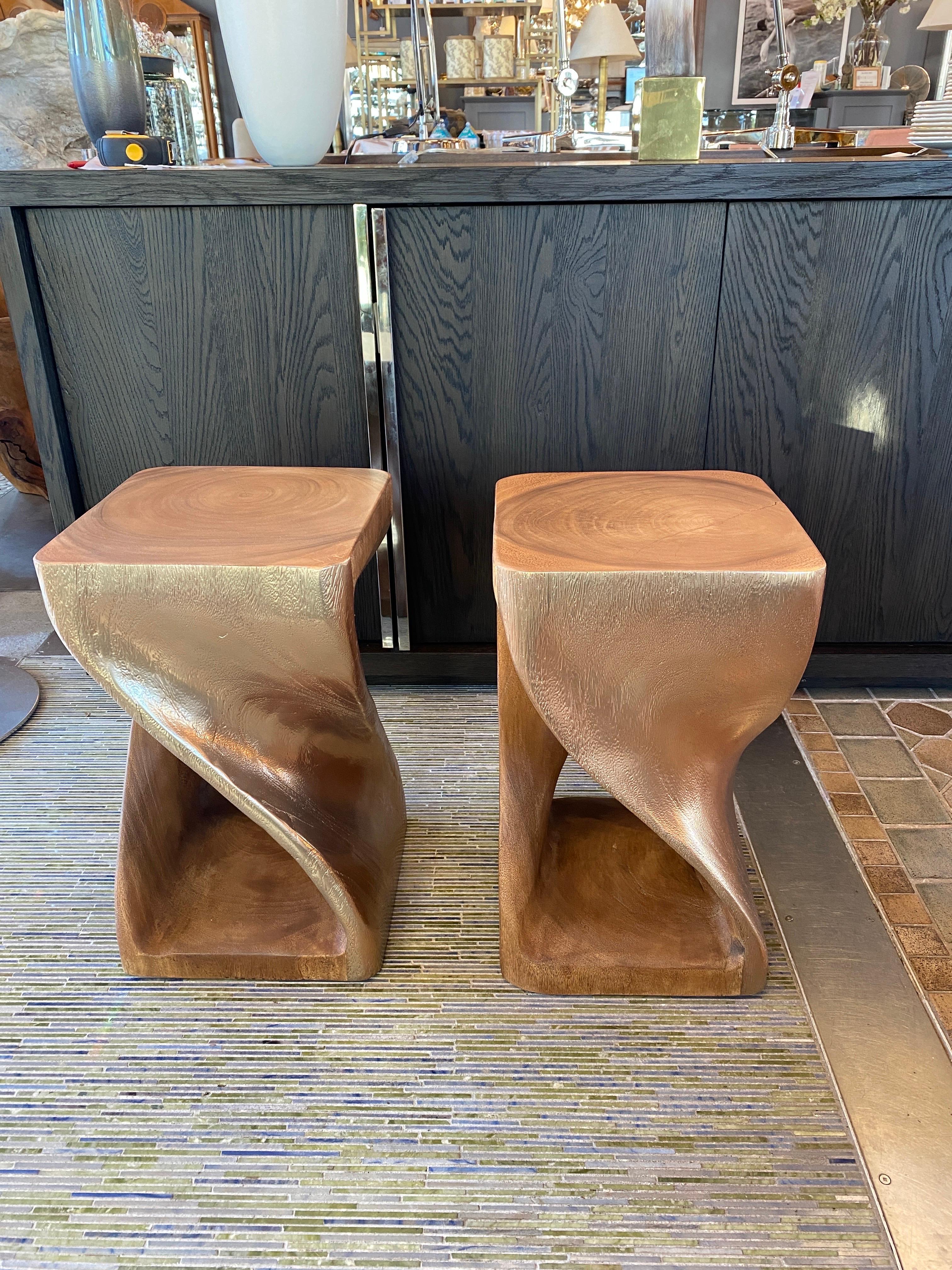 Pair of curved gold / wood side tables.