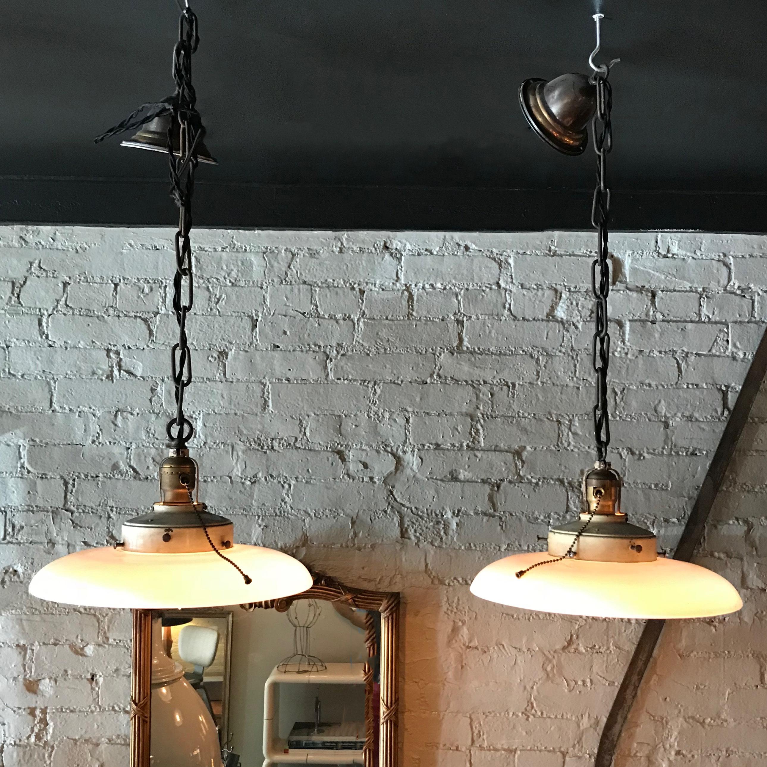 Pair of Curved Milk Glass Industrial Factory Pendant Lights In Good Condition In Brooklyn, NY