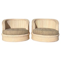 Pair of Curved Pencil Reed Swivel Chairs