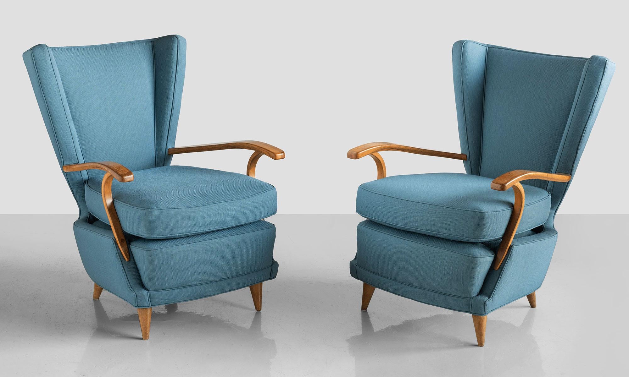 Pair of Curved Plywood Armchairs, Italy, circa 1950.

Dynamic form, with bentwood arms, newly reupholstered in Maharam Fabric.