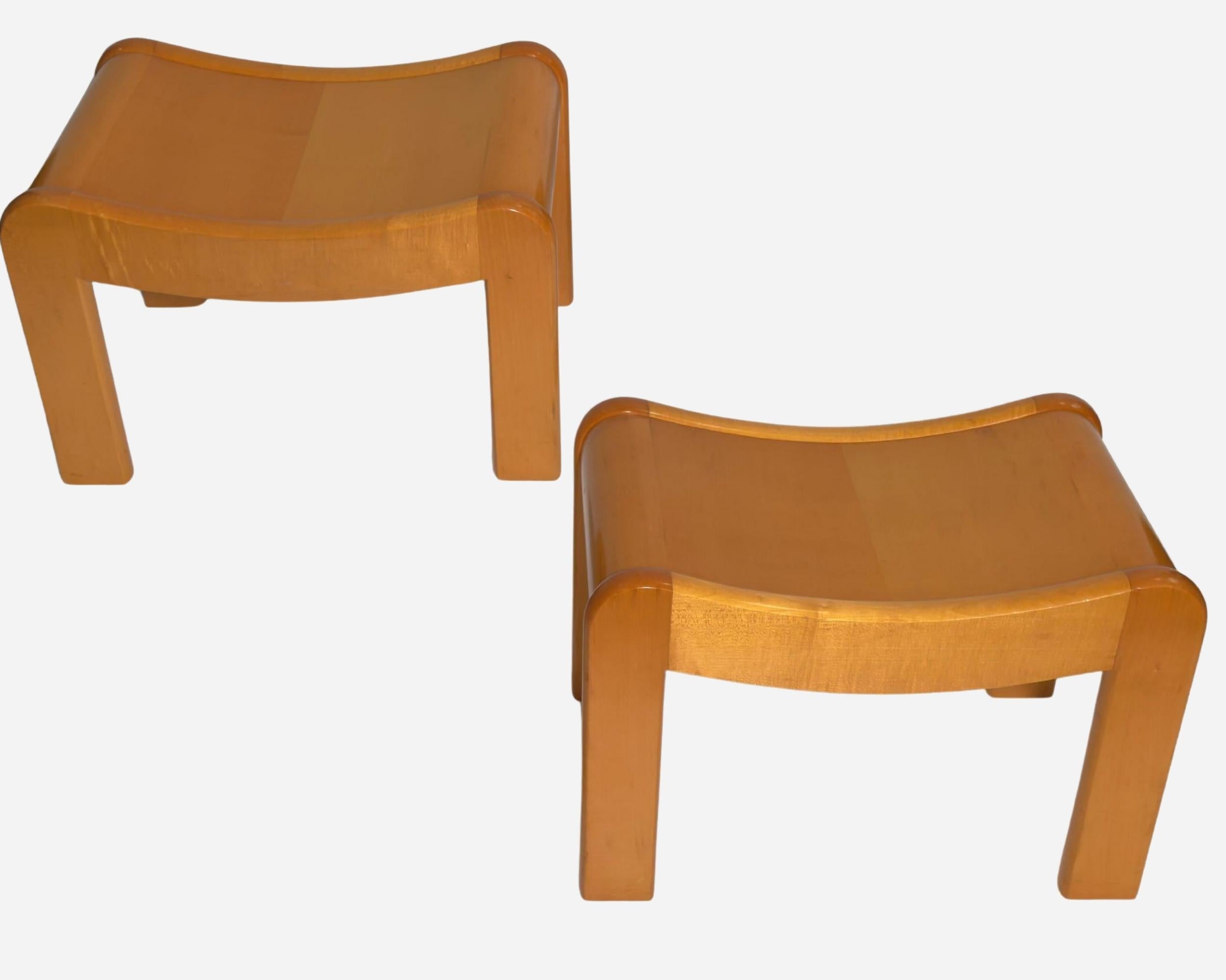 Pair of curved stools in varnished sycamore.

Biography
Pierre Chareau (1883 France – 1950 United States)
Pierre Chareau is one of the first modern interior designers in France using new materials, such as glass or steel.
Pierre Chareau was born in
