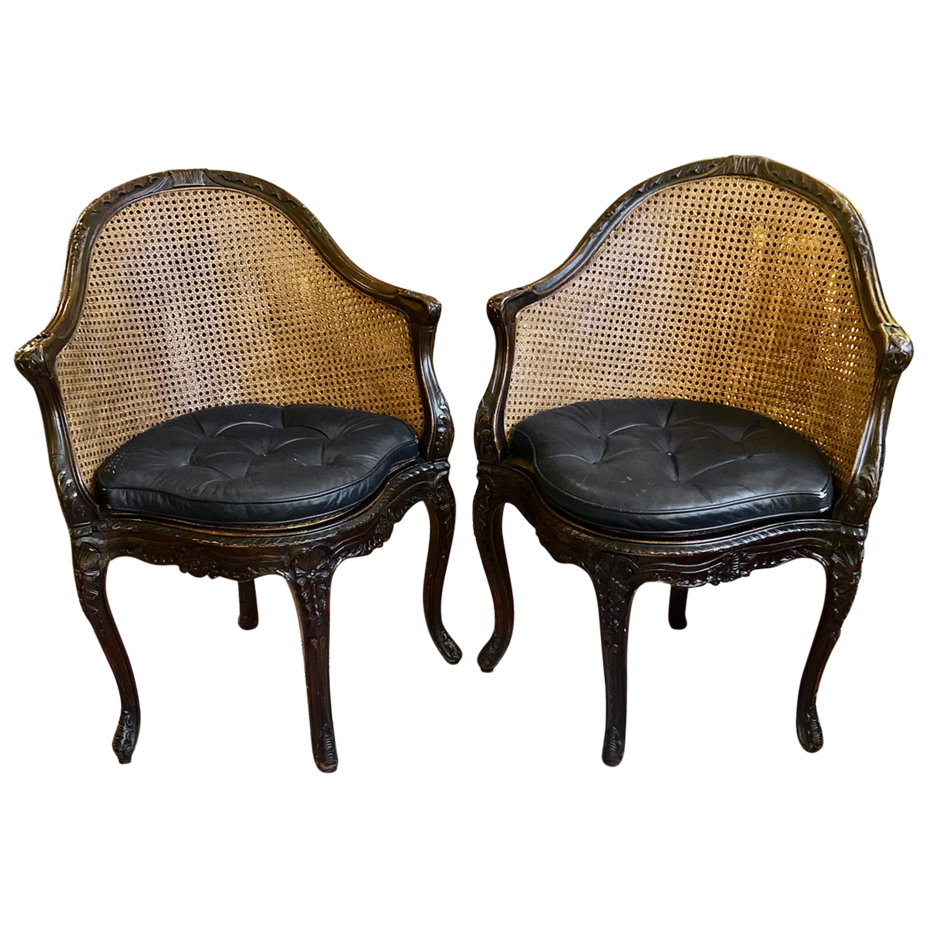 Pair of Curvy Carved Walnut and Double Caned French Louis XVI Style Chairs