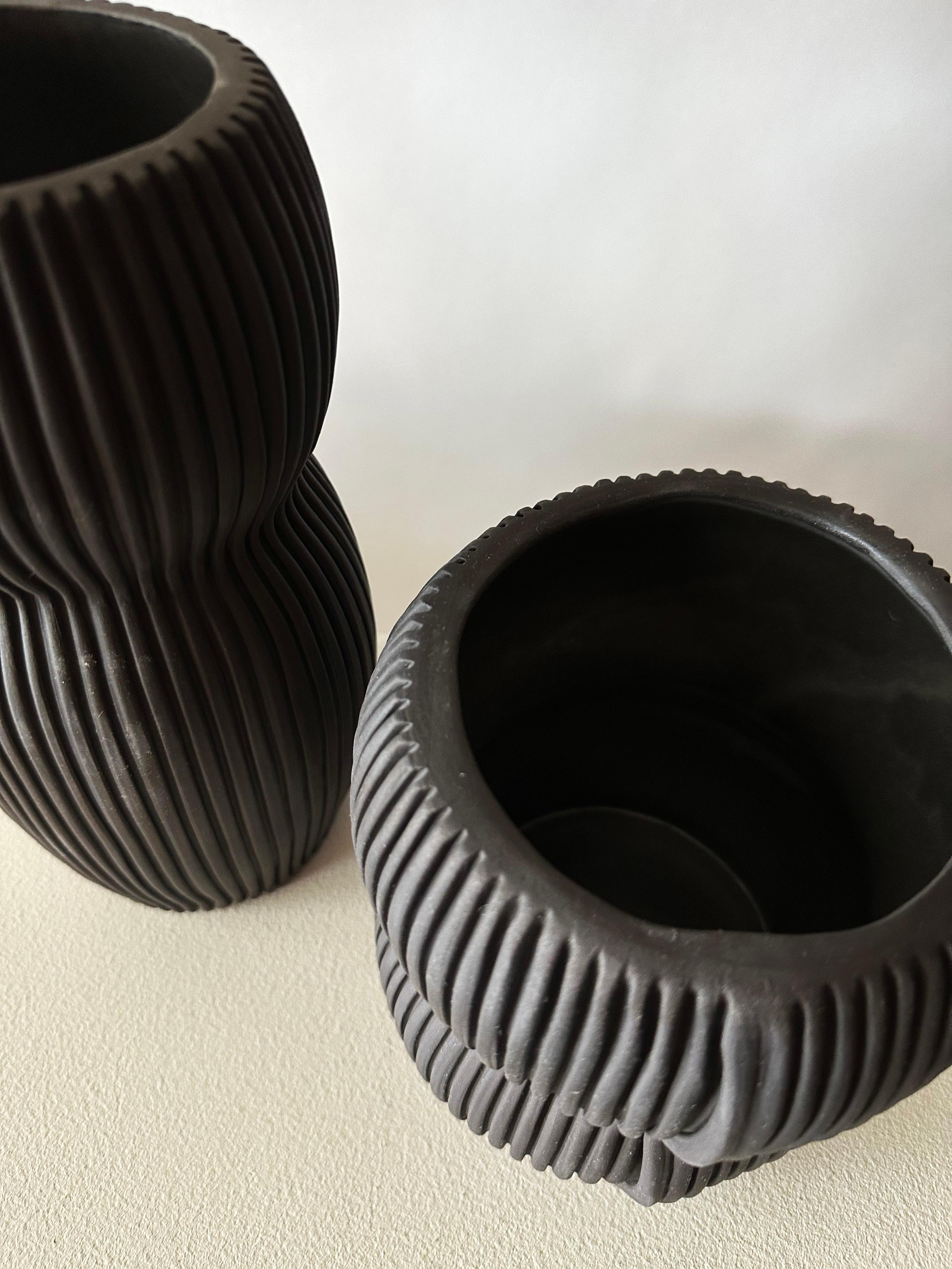 American Pair of Curvy Textured Black Porcelain Vases by Cym Warkov For Sale