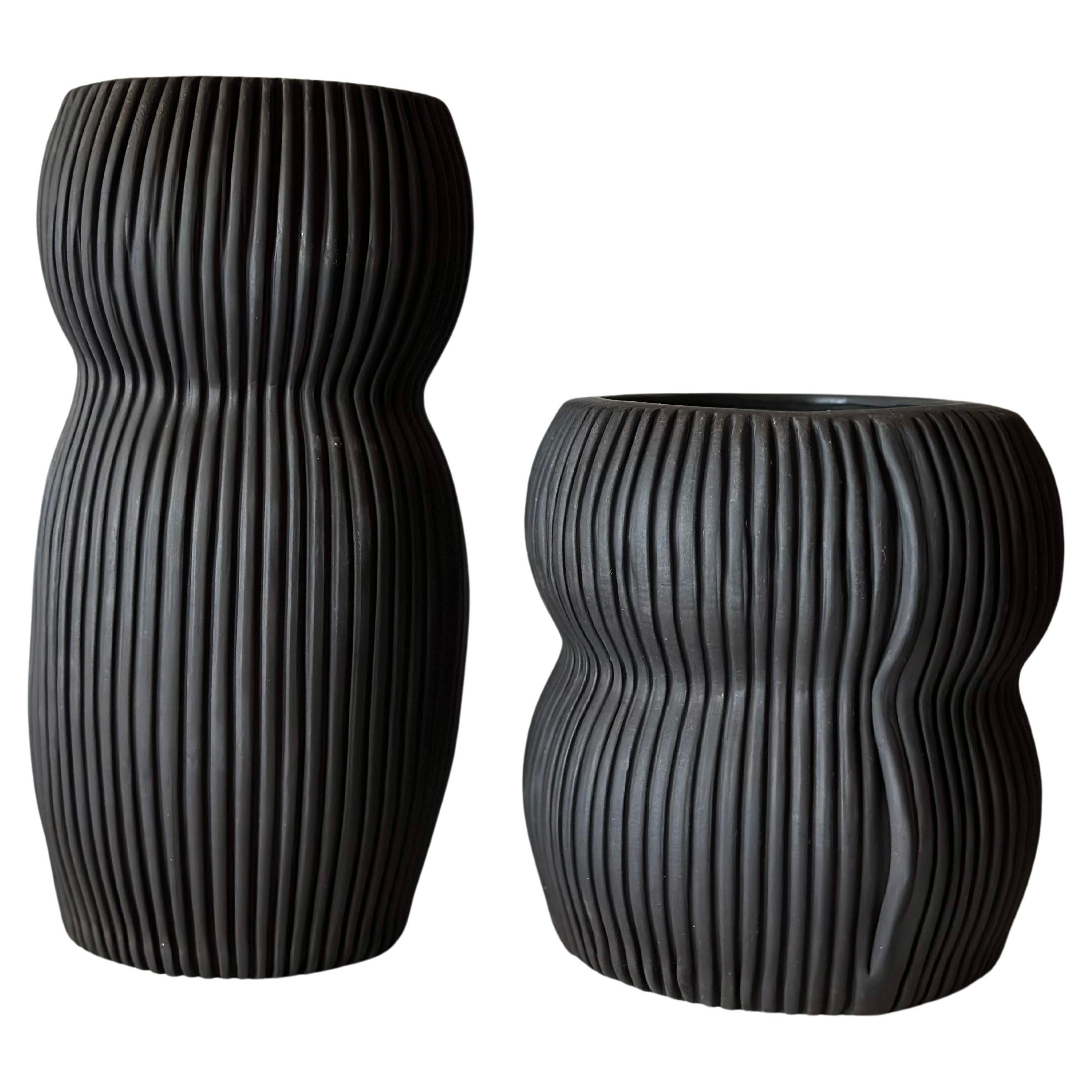 Pair of Curvy Textured Black Porcelain Vases by Cym Warkov For Sale