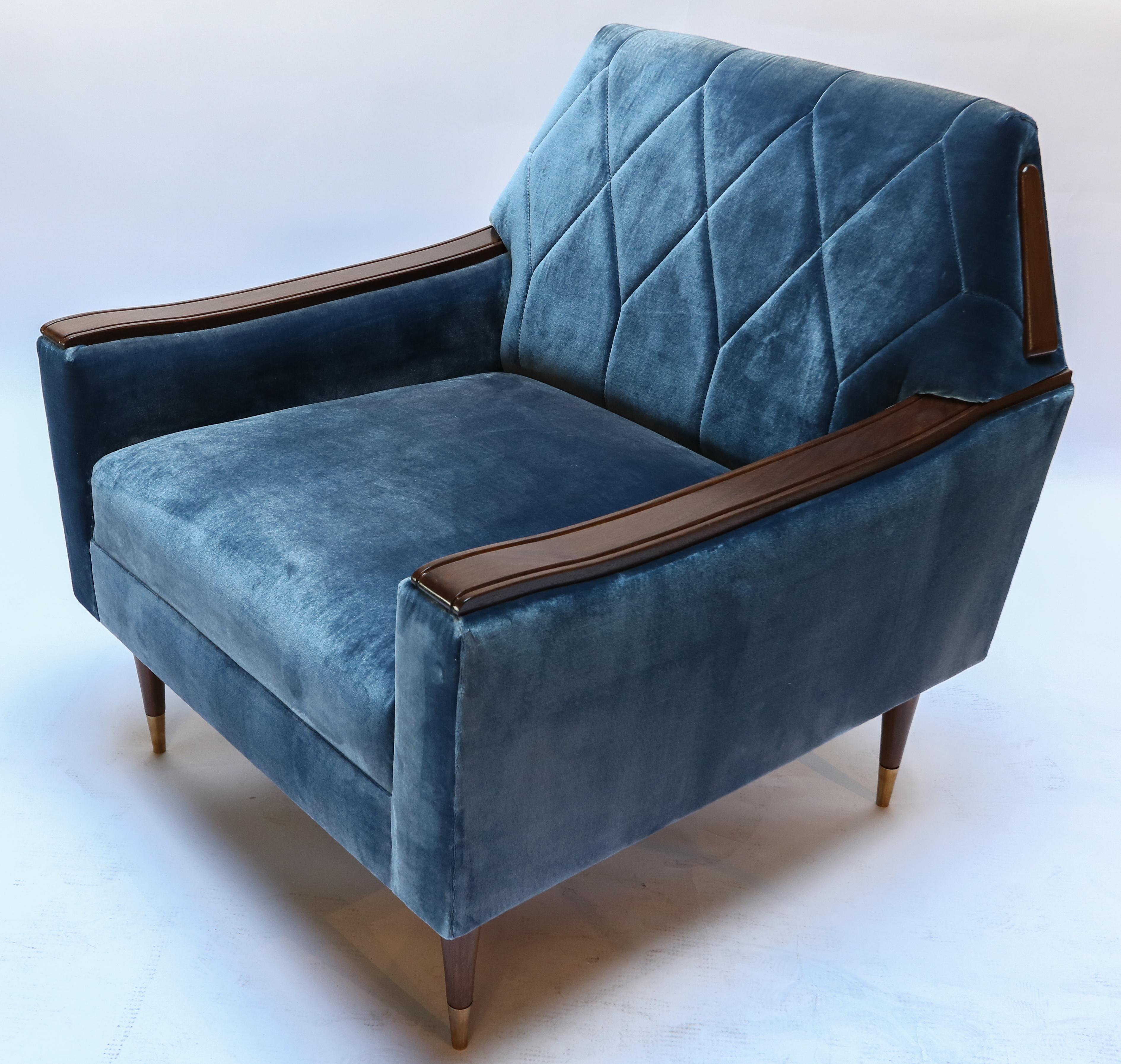 Pair of custom 1960s style armchairs upholstered in blue silk velvet with wood and brass details.  Made in Los Angeles by Adesso Imports. Can be done in different colors, fabrics and finishes.
