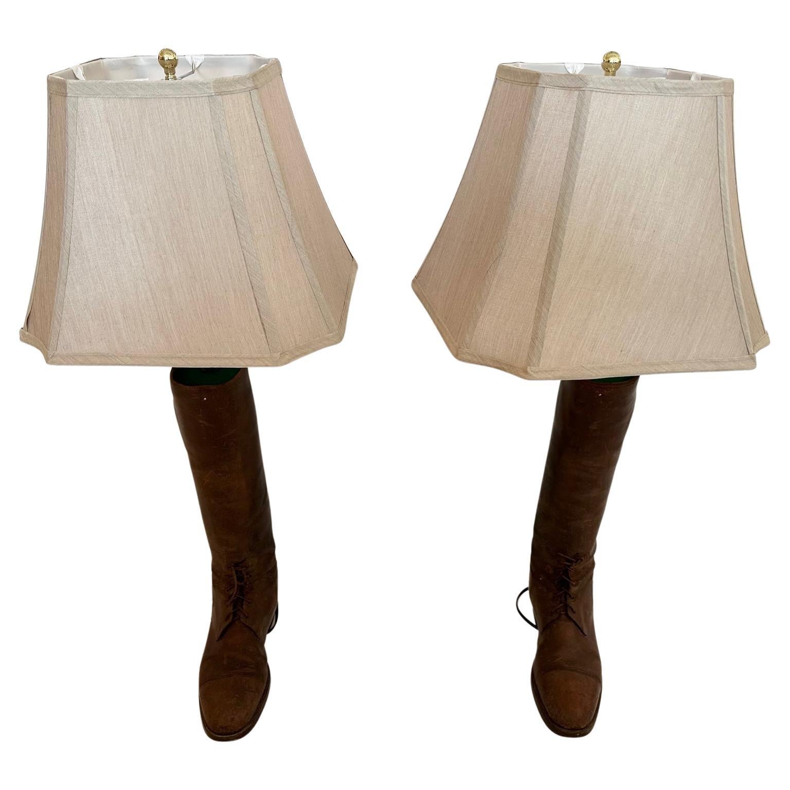Unusual and rich in character pair of custom table lamps created out of crusty antique English leather riding boots.