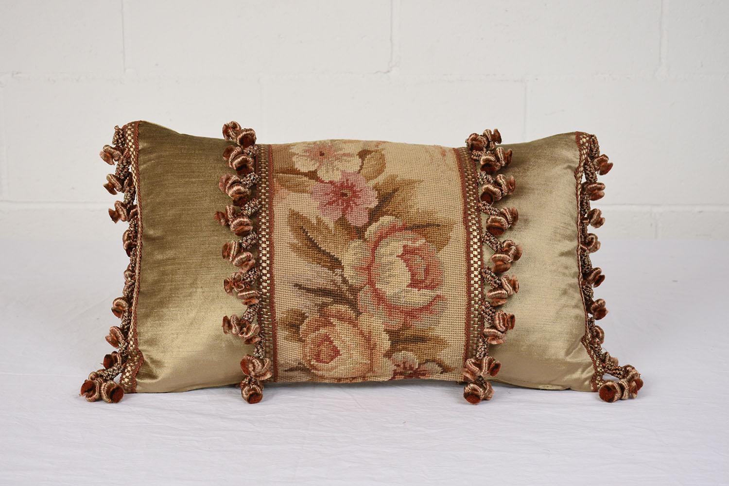 This beautiful pair of French accent decorative pillows are made out of antique floral pattern tapestry and combination with gold color velvet fabric on the sides and back and beautifully finished with decorative multicolored tassels and down