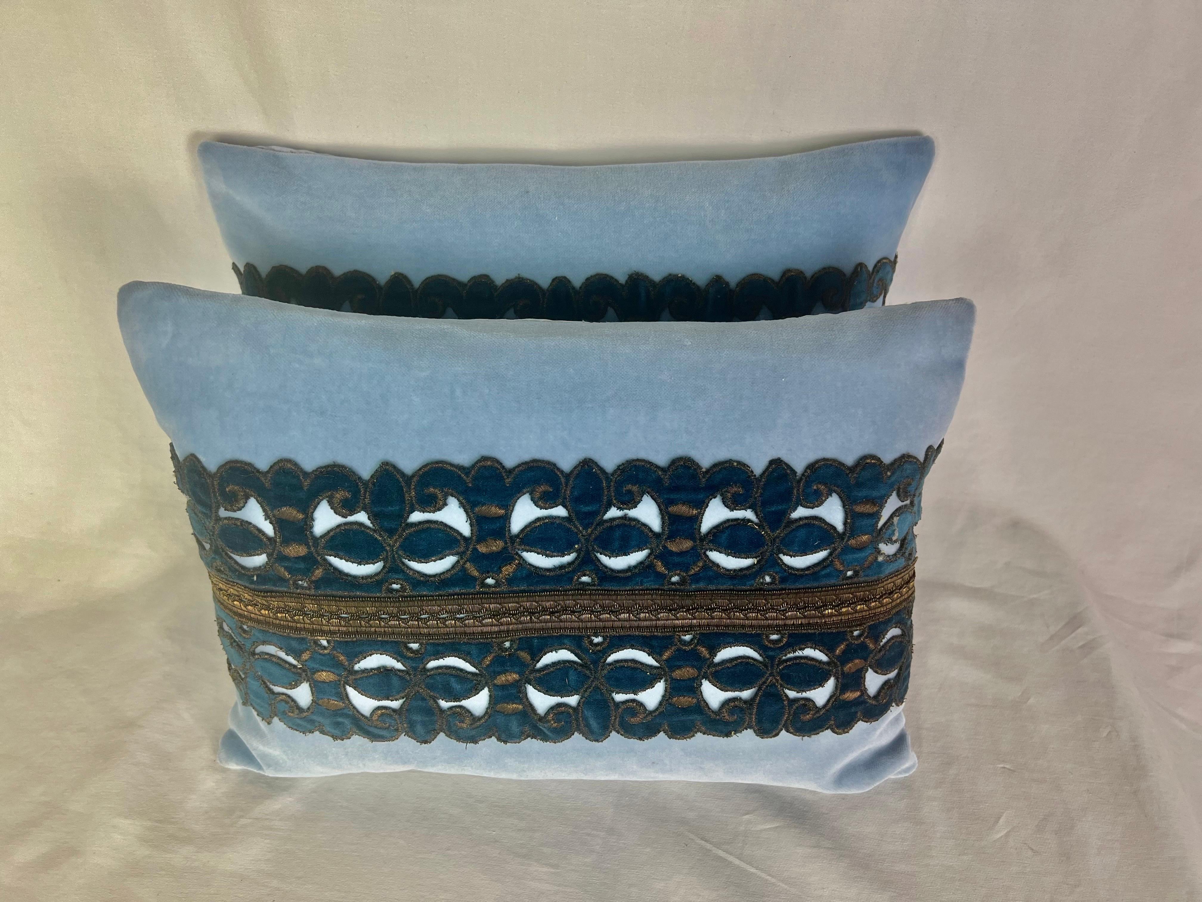 Pair of custom petite decorative pillows made with 19th century velvet & metallic gold banding coordinated with a blue velvet background and silk backs. Down inserts, zipper closures.