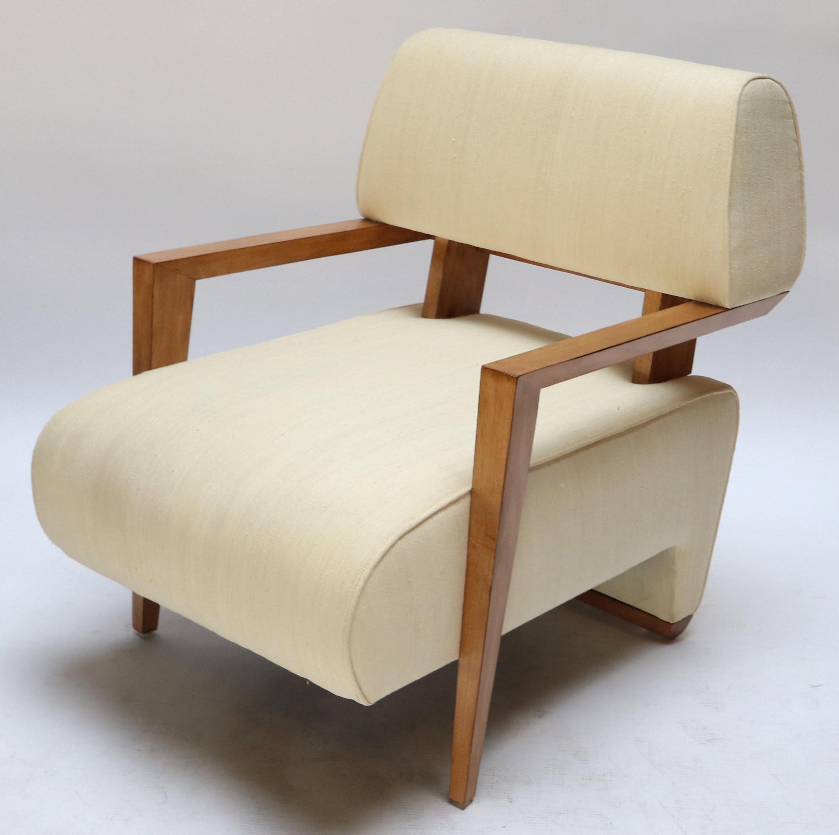 Pair of custom Art Deco midcentury style armchairs upholstered in ivory silk. Made in Los Angeles by Adesso Imports. Can be done in different wood and fabric.