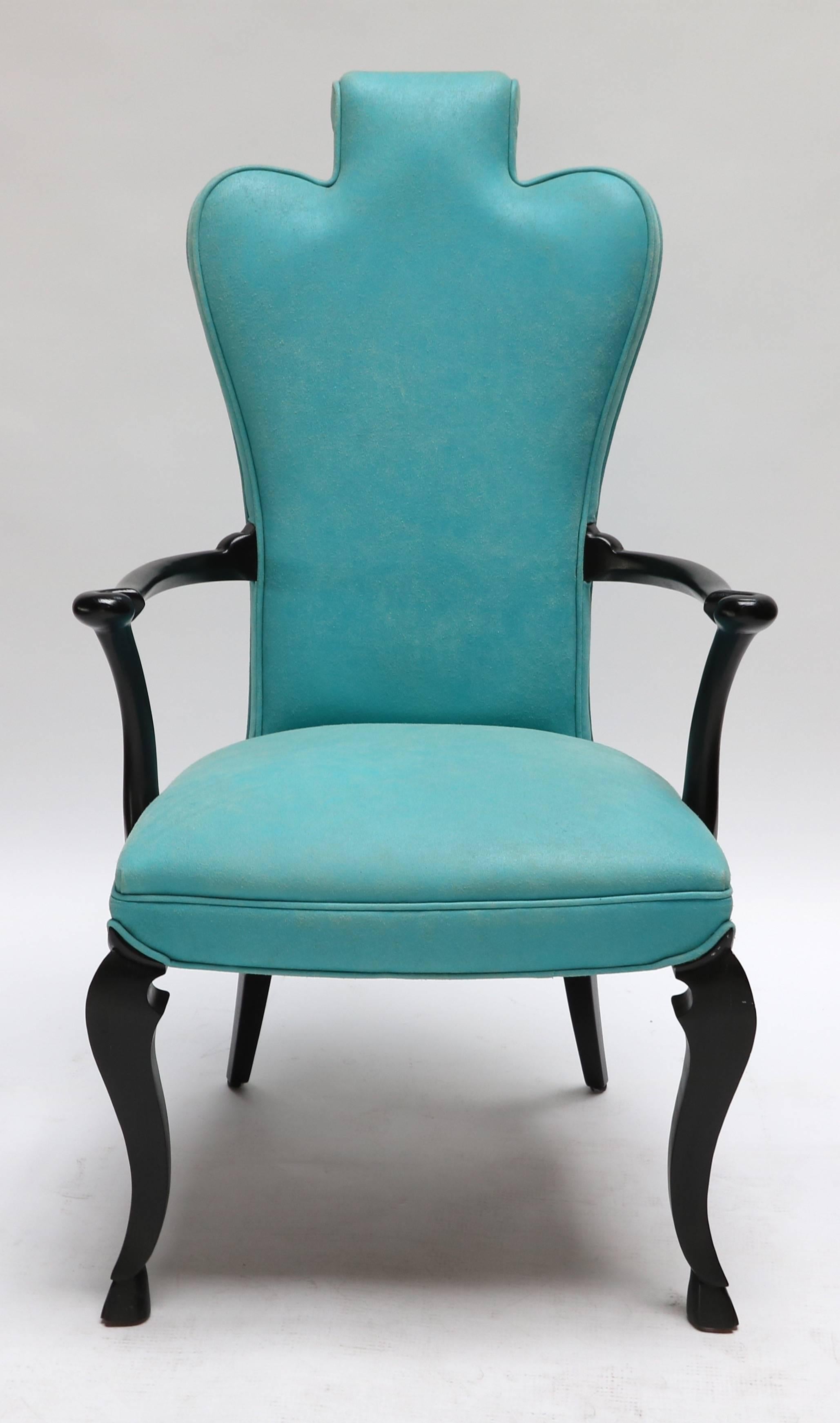 Pair of custom black lacquer armchairs by Adesso Imports upholstered in turquoise distressed leather. Sale price is for floor model only.



