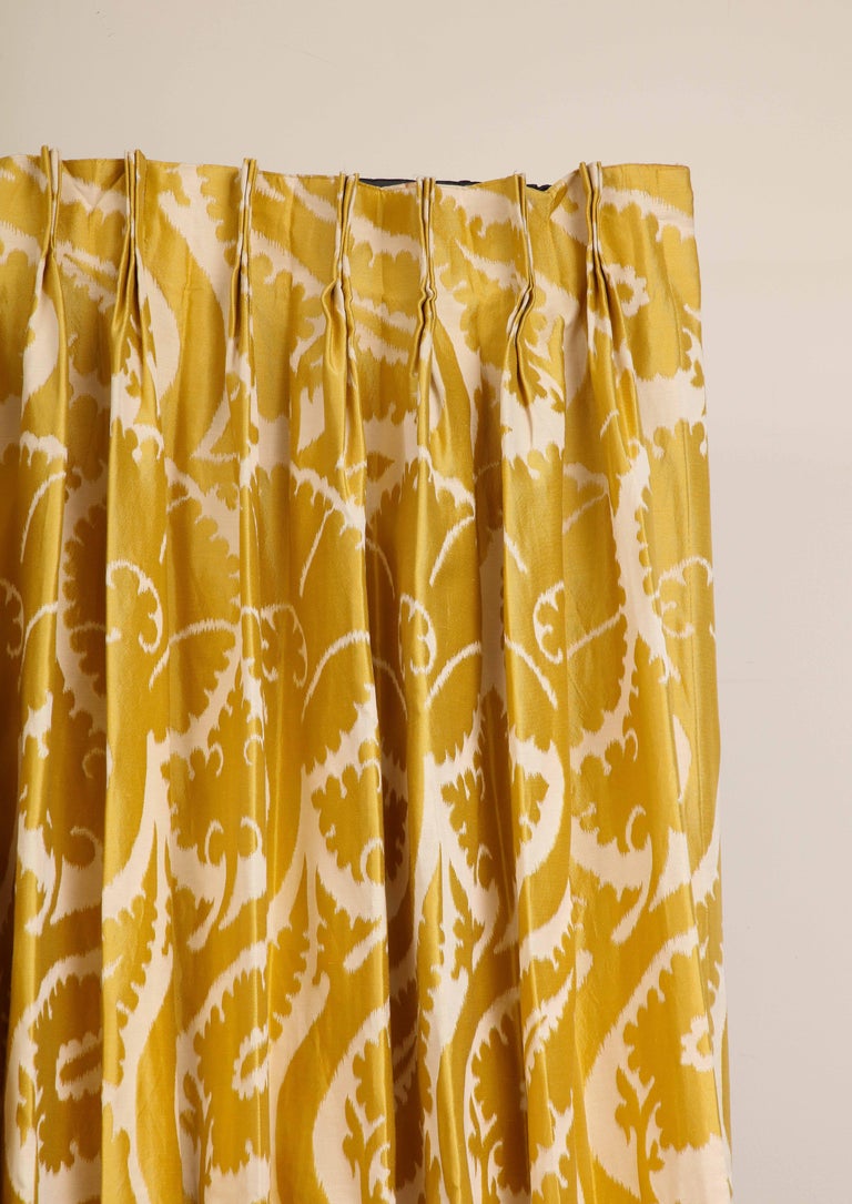 A pair (2 panels) of custom blackout drapes in Pierre Frey Sidonia Girasole 2 golden yellow fabric. The panels each feature 16 panels with a 5