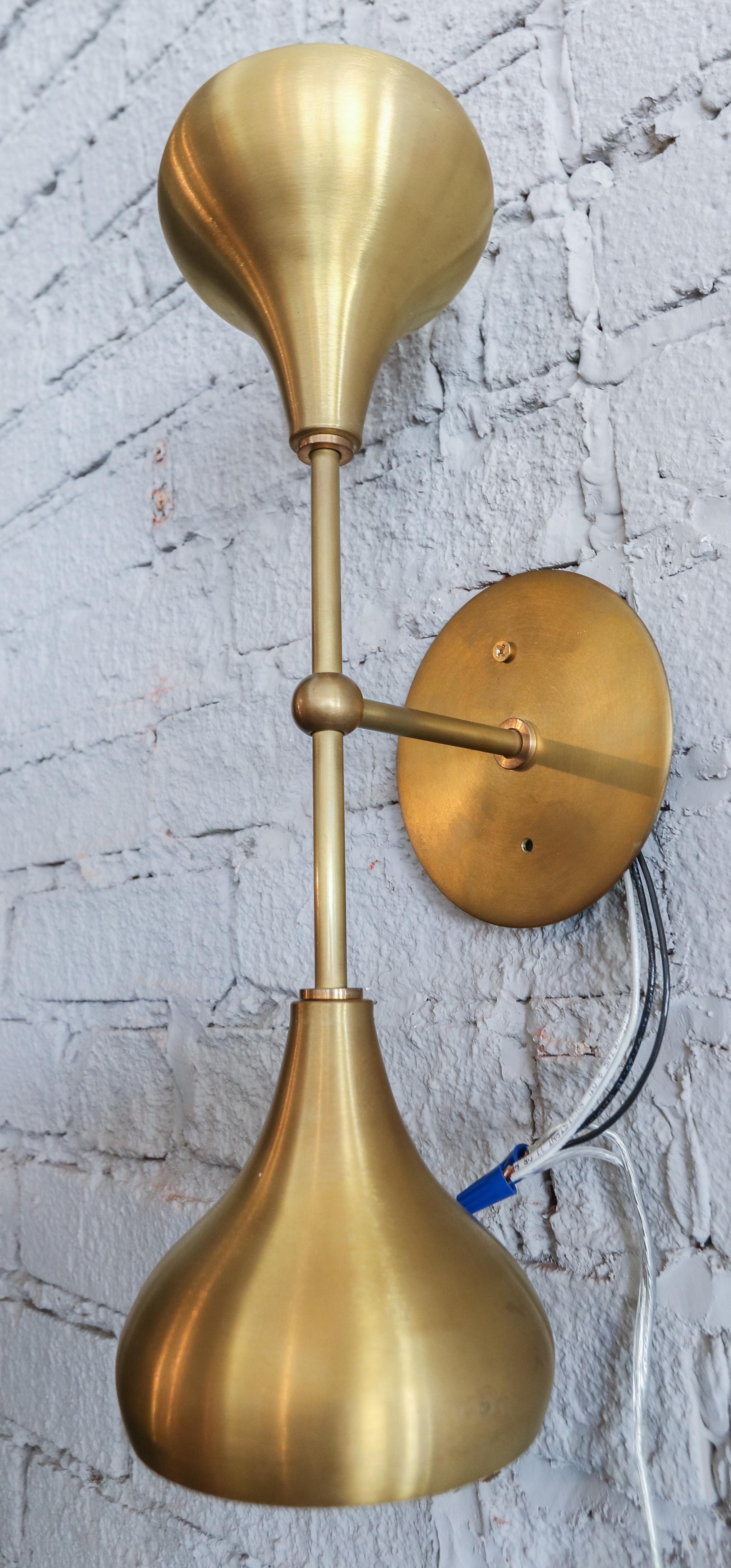 Pair of custom brass double head midcentury style sconces by Adesso Imports. Can be hung vertically or horizontally. Can be done in different metals.