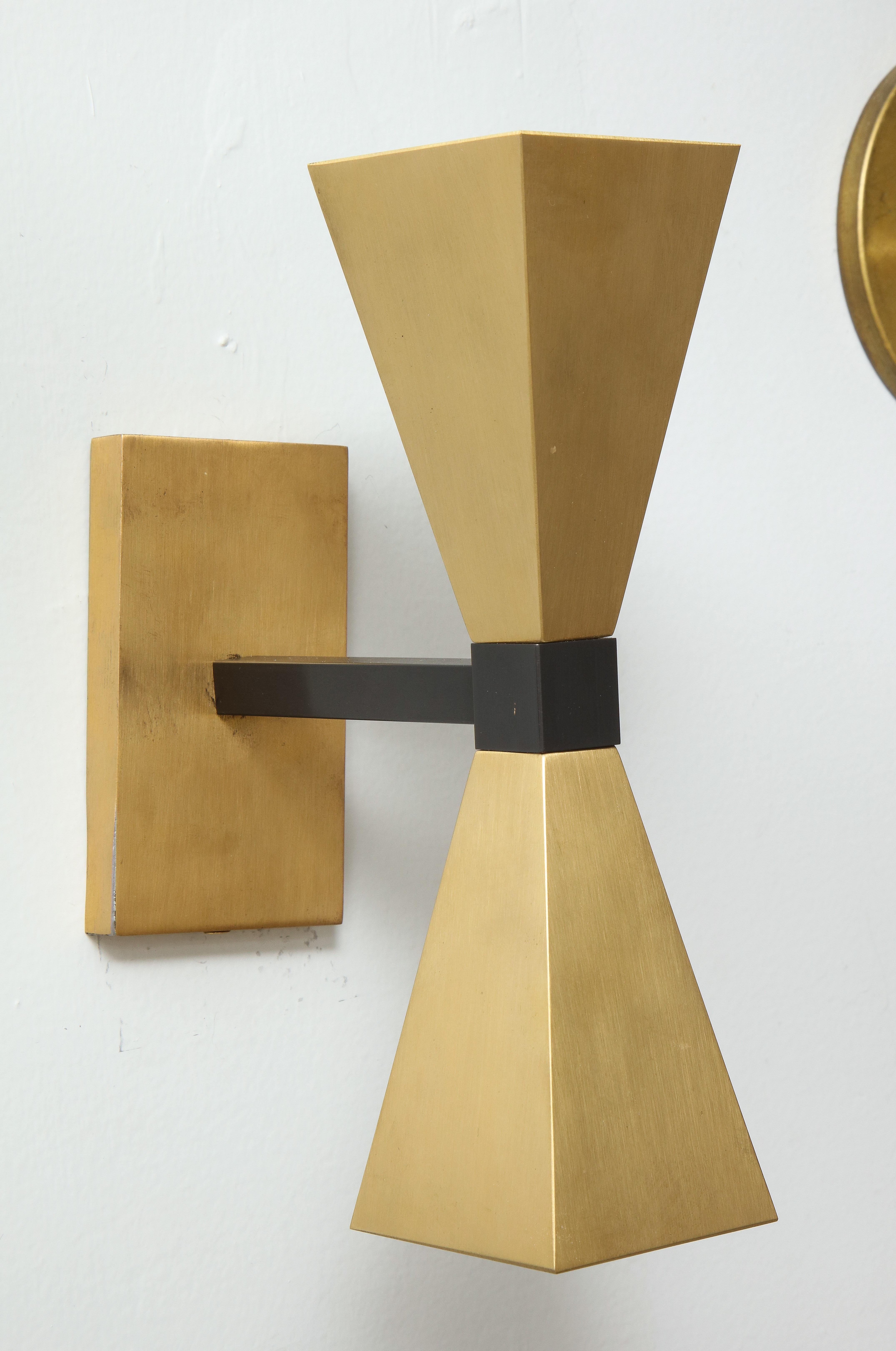 Pair of custom brass sconces in the Style of Mid-Century Modern.
Lead Time for customs made is 8-10 weeks.