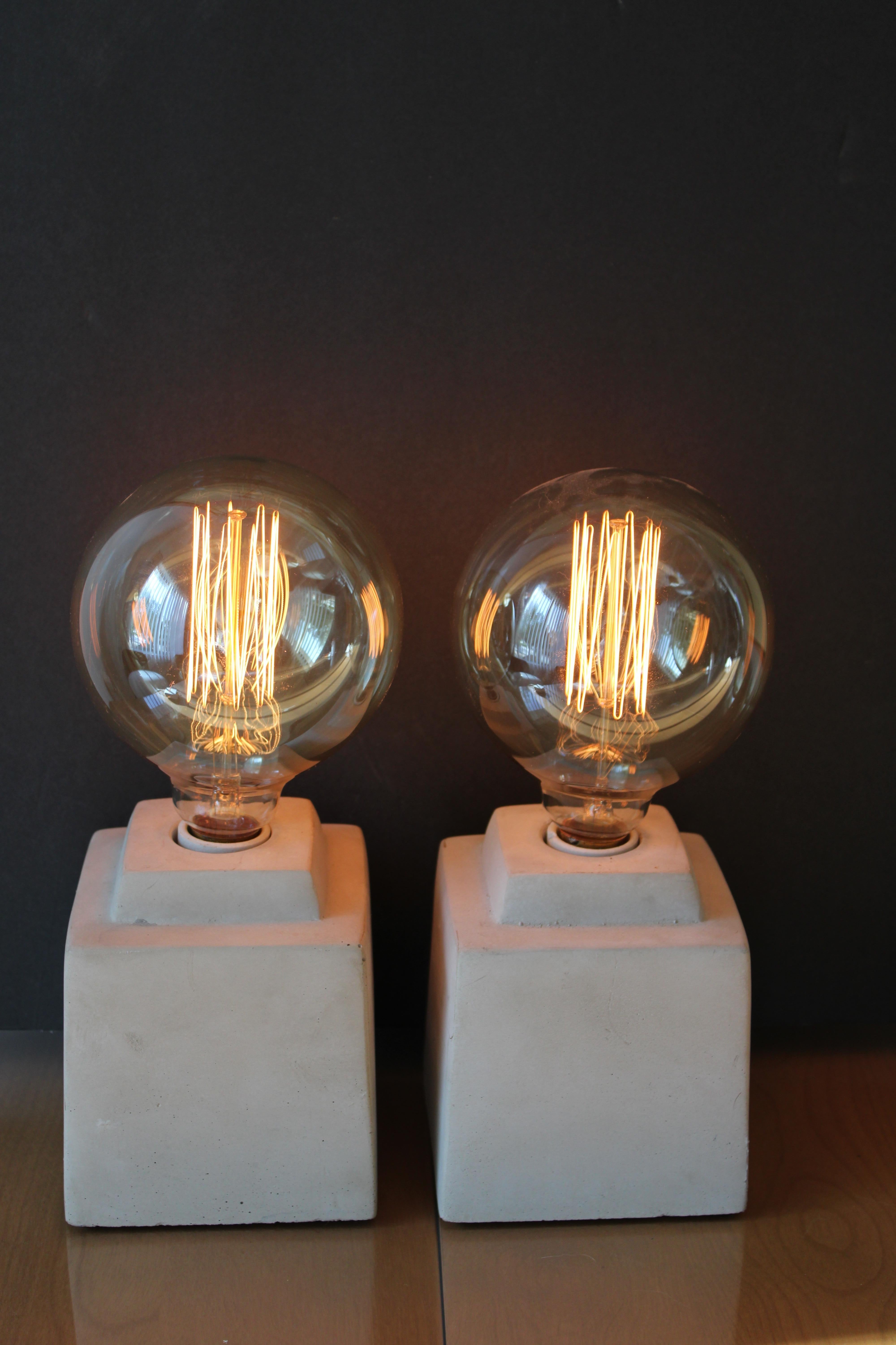 Pair of custom made ceramic lamps. Ceramic portions measure 4.75