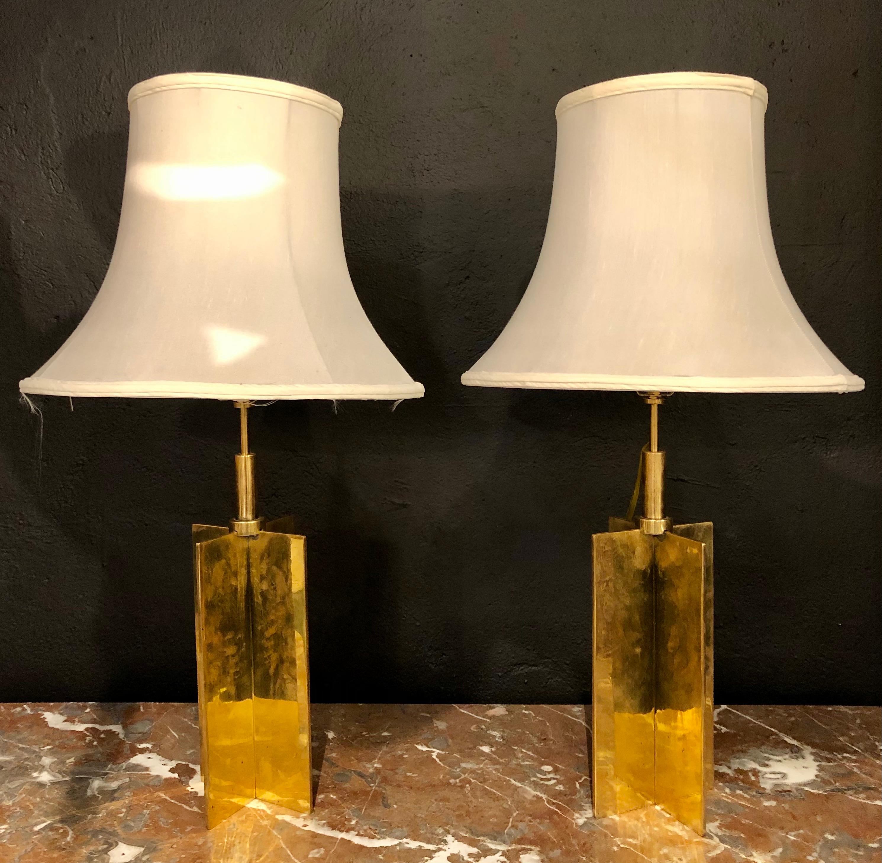 Pair of custom Croisillion lamps in The Jean Michel Frank Manner. These solid bronze X-form table lamps are simply stunning. The sleek and simplistic form reminiscent of a pair by Frank. Each take a single sixty watt light bulb. The pair come