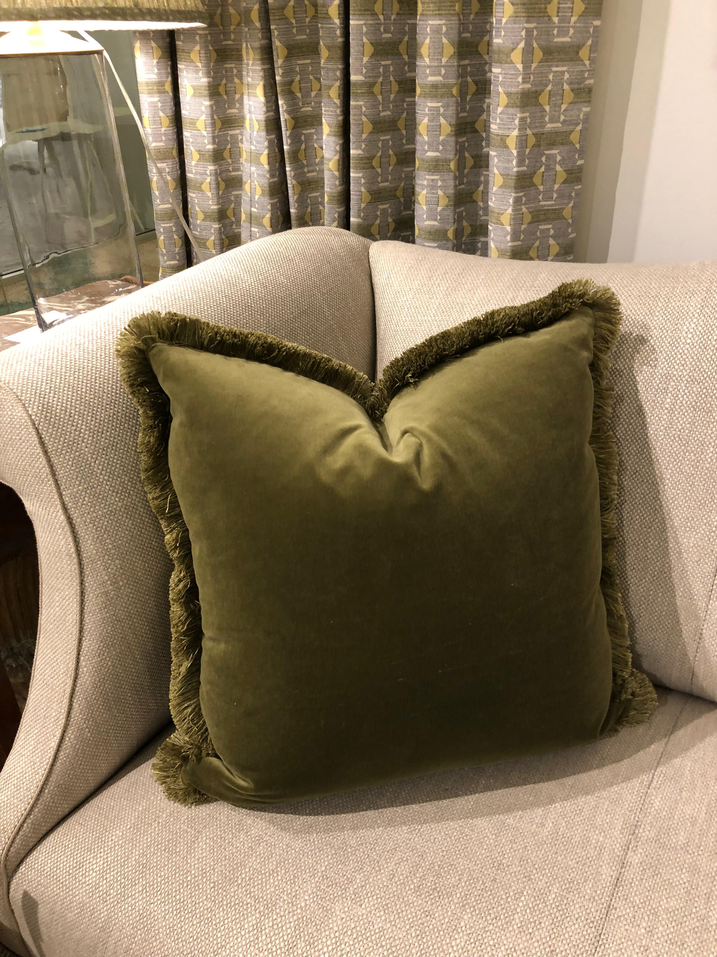 Pair of custom green velvet fringe pillows.