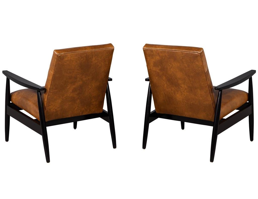 pair of leather accent chairs