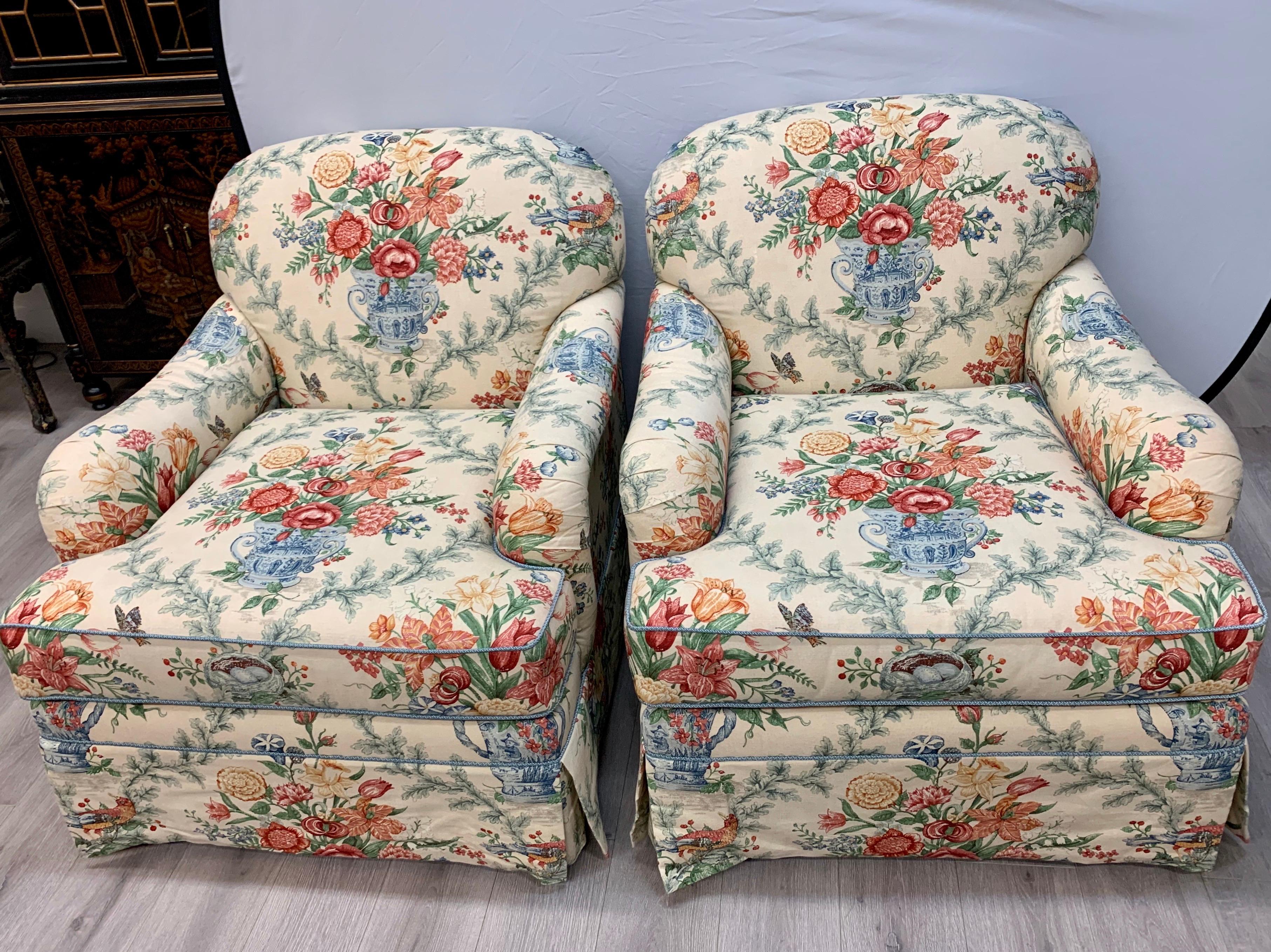 Big, colorful, pair of chintz club chairs with yellow being the base color. Guaranteed to brighten any
room. Feature eight way hand tied construction for the ultimate seating comfort. Now, more than ever, home is where the heart is.