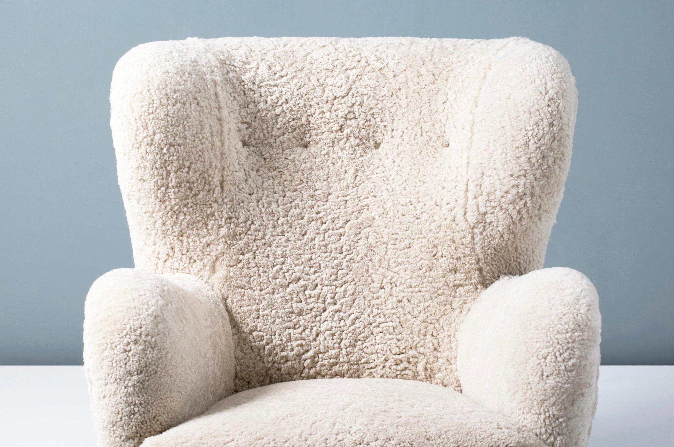 Custom made one-off armchairs with stained beech legs, solid wood frame and fully sprung seat. The chairs are to be upholstered in client supplied fabric. 

Chair measurements:

Height 92cm
Depth 84cm
Width 83cm
Seat height 42cm.

 