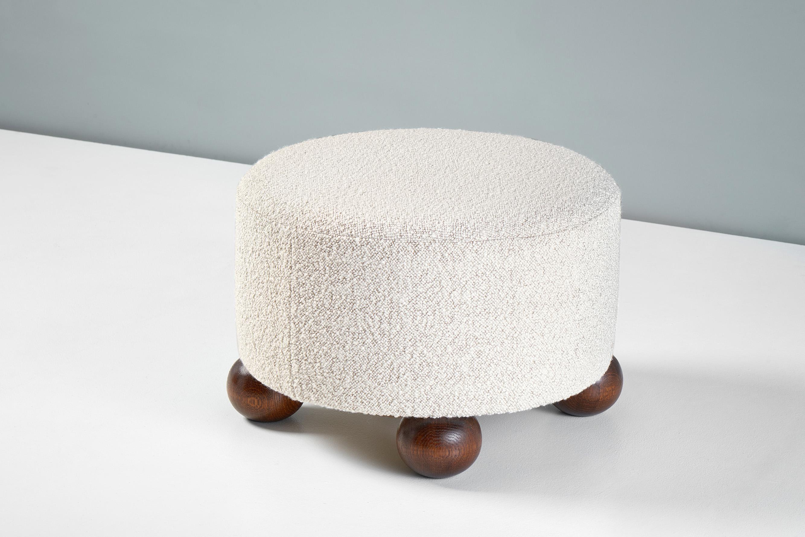 Scandinavian Modern Pair of Custom Made Round Boucle Ottomans with Oak Ball Feet. Available in COM For Sale