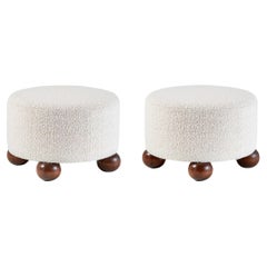 Pair of Custom Made Round Boucle Ottomans with Oak Ball Feet. Available in COM