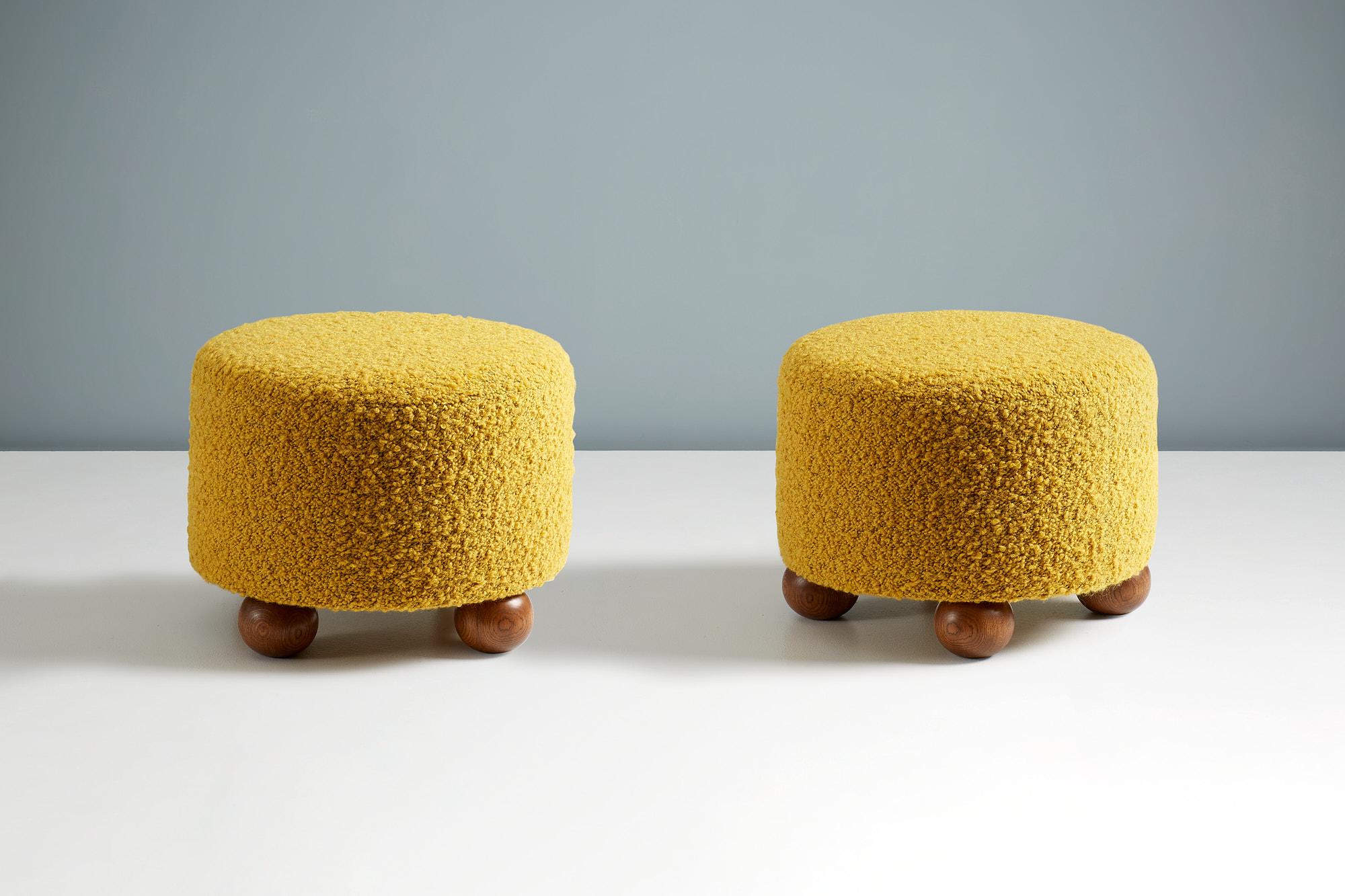 British Pair of Custom Made Round Boucle Ottomans with Oak Ball Feet For Sale
