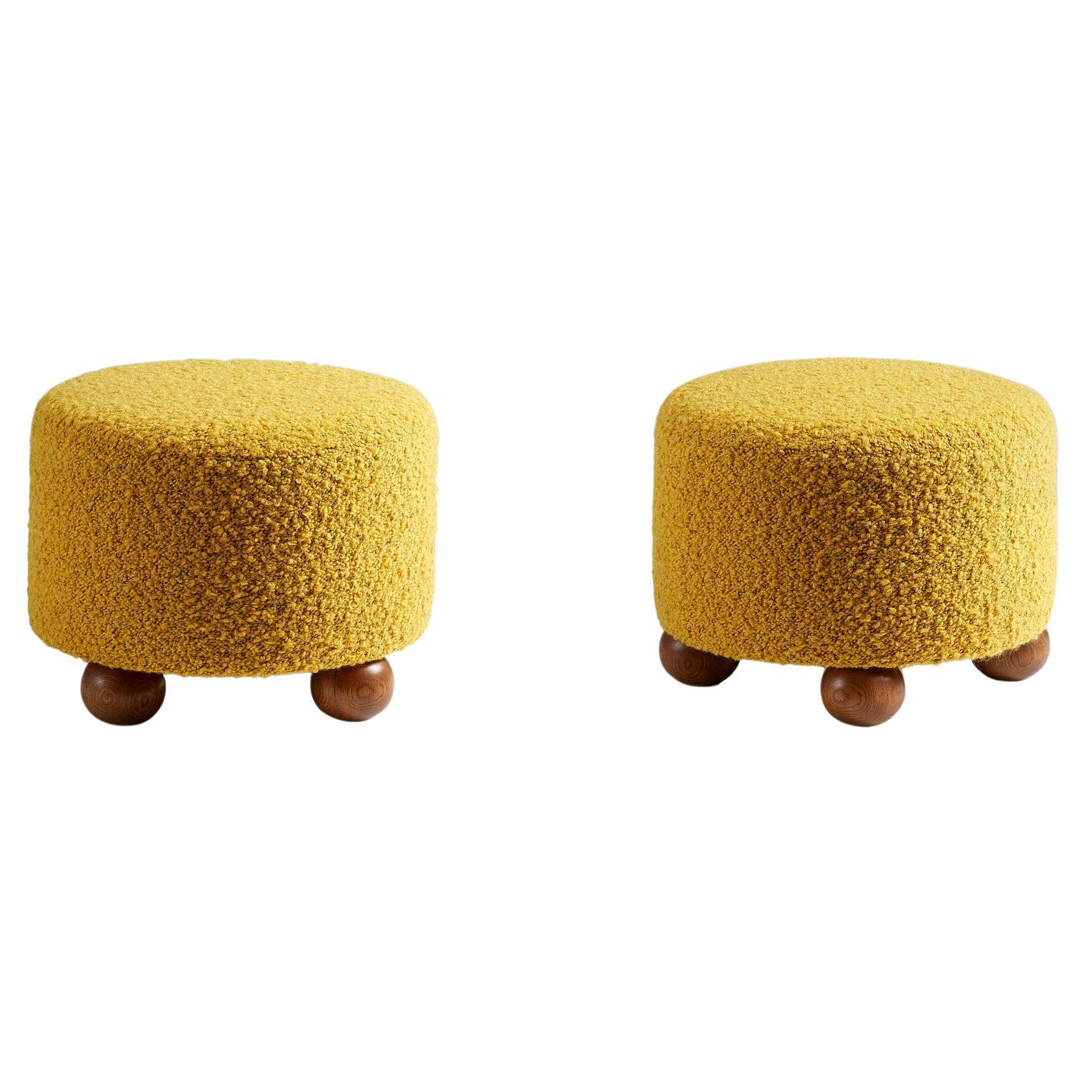 Pair of Custom Made Round Boucle Ottomans with Oak Ball Feet