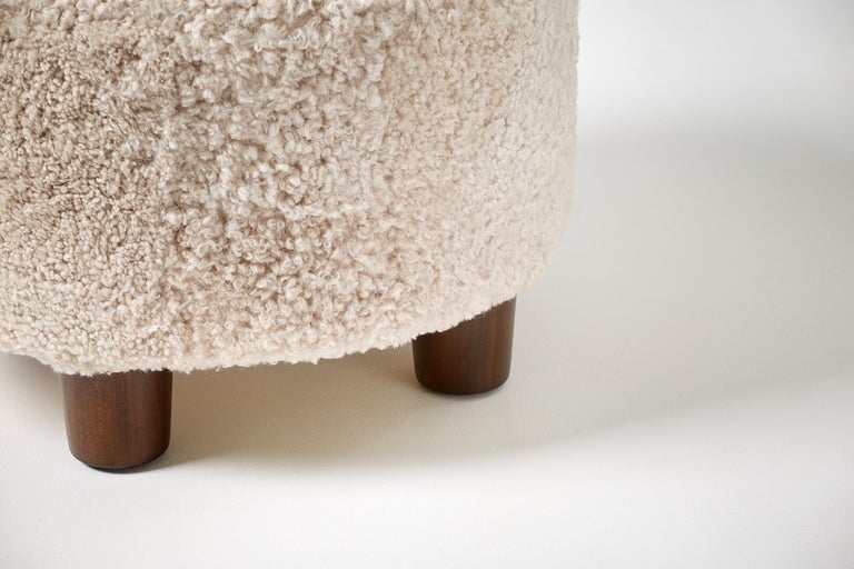 British Pair of Custom Made Round Shearling Ottomans For Sale