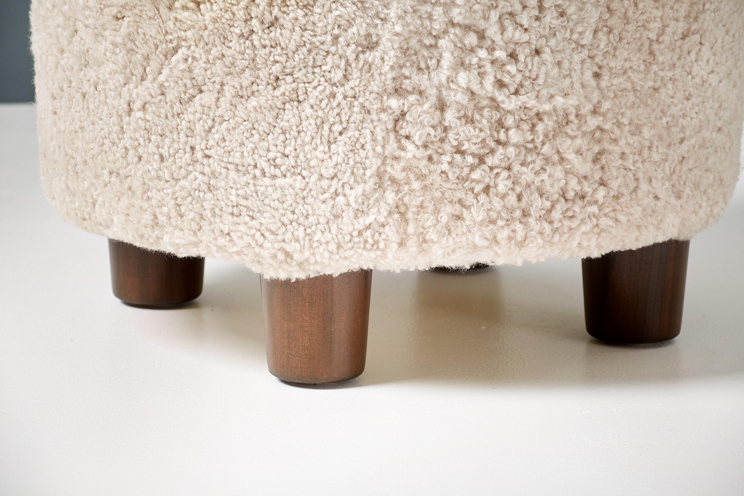 Scandinavian Modern Pair of Custom Made Round Shearling Ottomans For Sale
