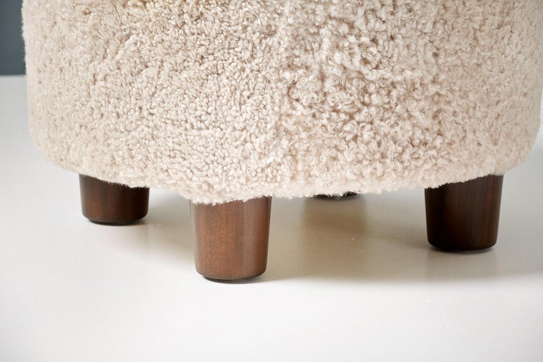 Contemporary Pair of Custom Made Round Shearling Ottomans For Sale