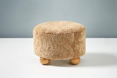 Pair of Custom Made Round Sheepskin Ottomans with Oak Ball Feet