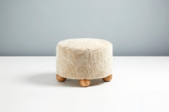 Pair of Custom Made Round Sheepskin Ottomans with Oak Ball Feet