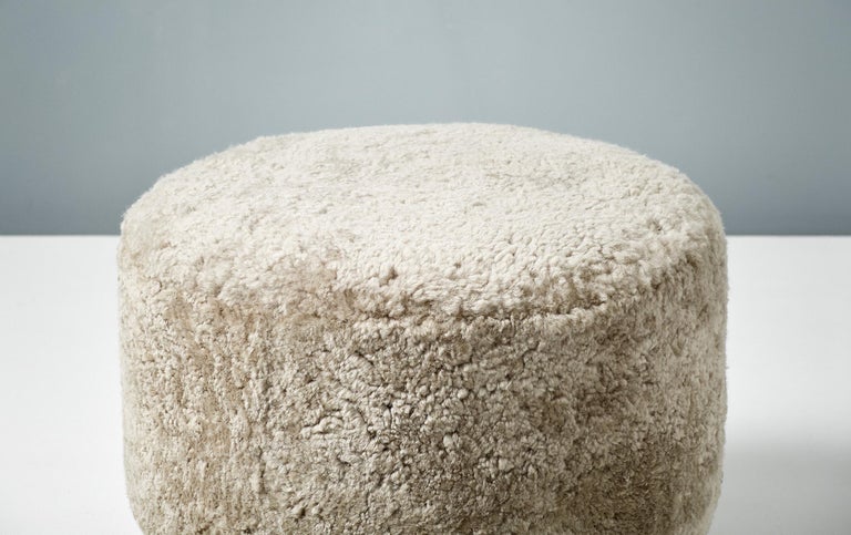 Contemporary Pair of Custom Made Round Sheepskin Ottomans with Oak Ball Feet For Sale