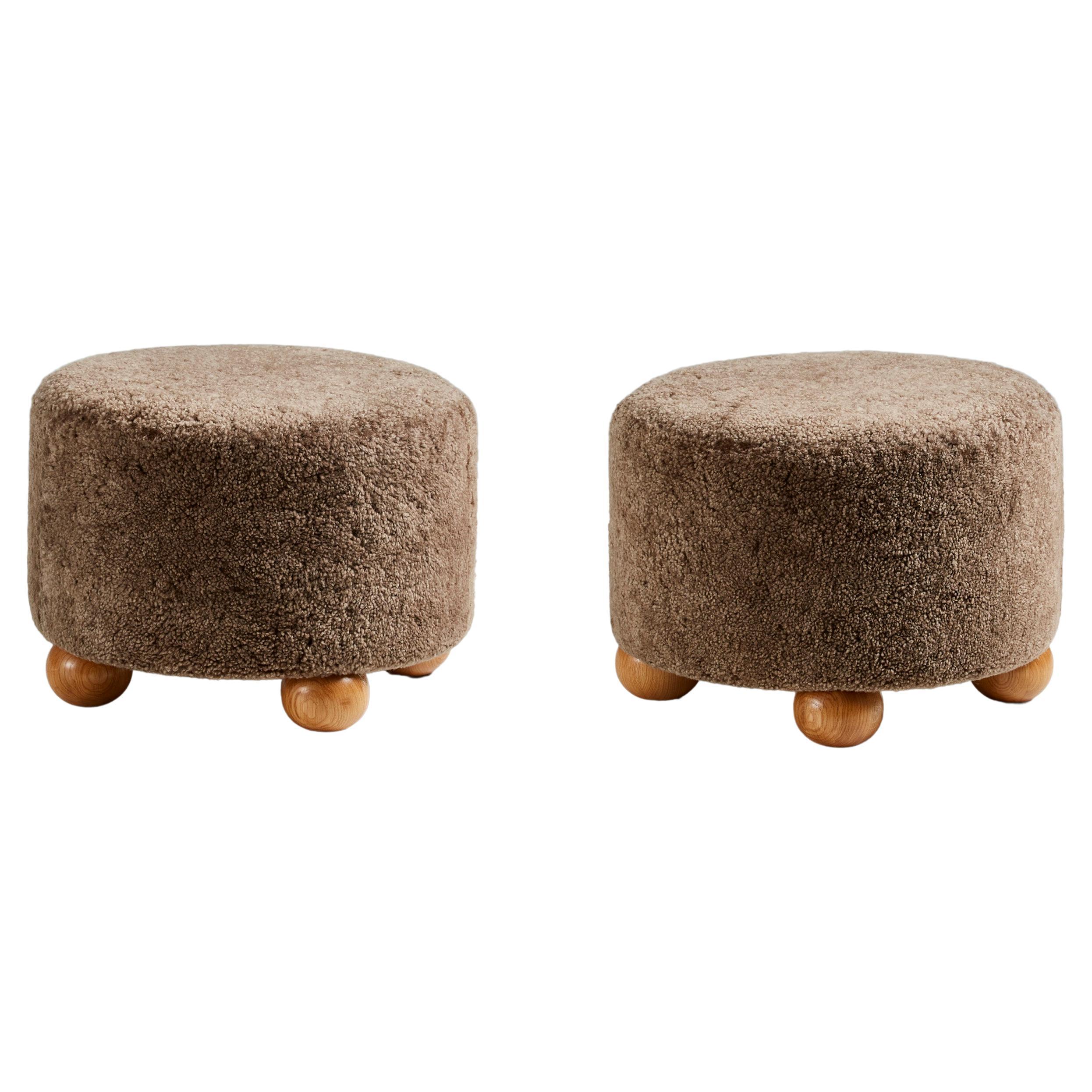 Pair of Custom Made Round Sheepskin Ottomans with Oak Ball Feet For Sale