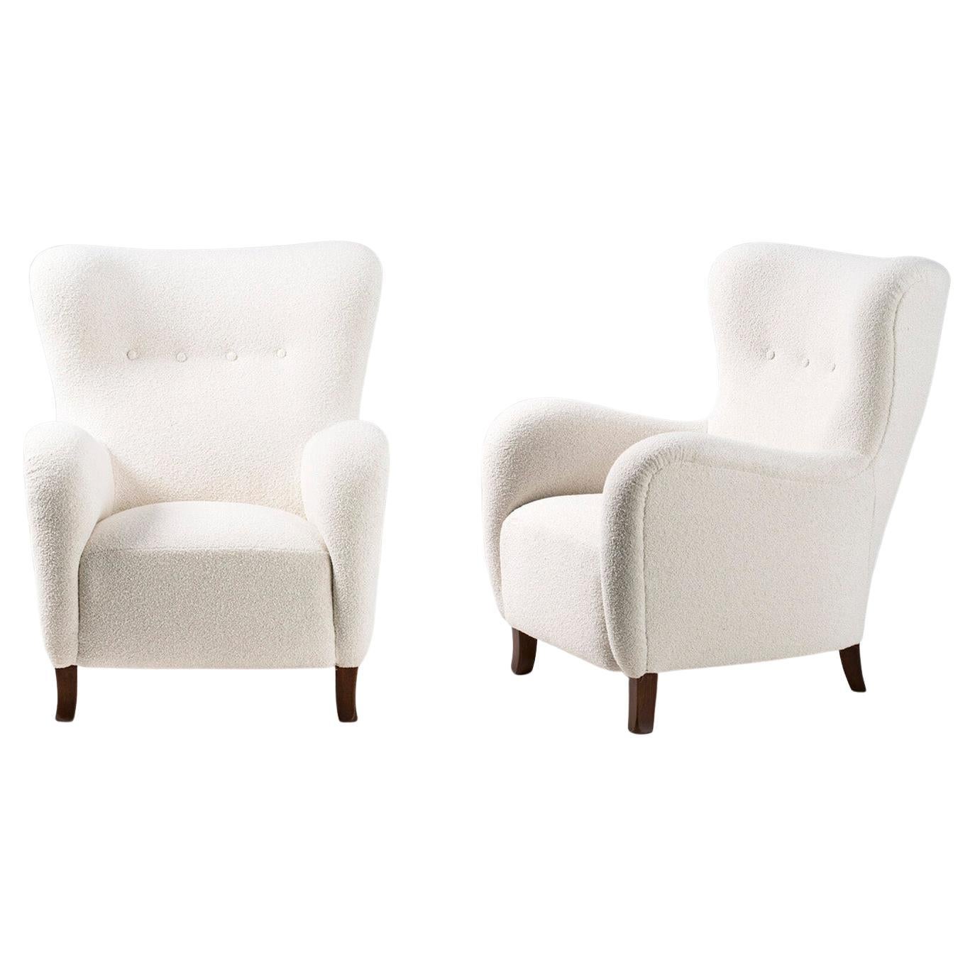 Pair of custom Made Sampo Boucle Wing Chairs For Sale