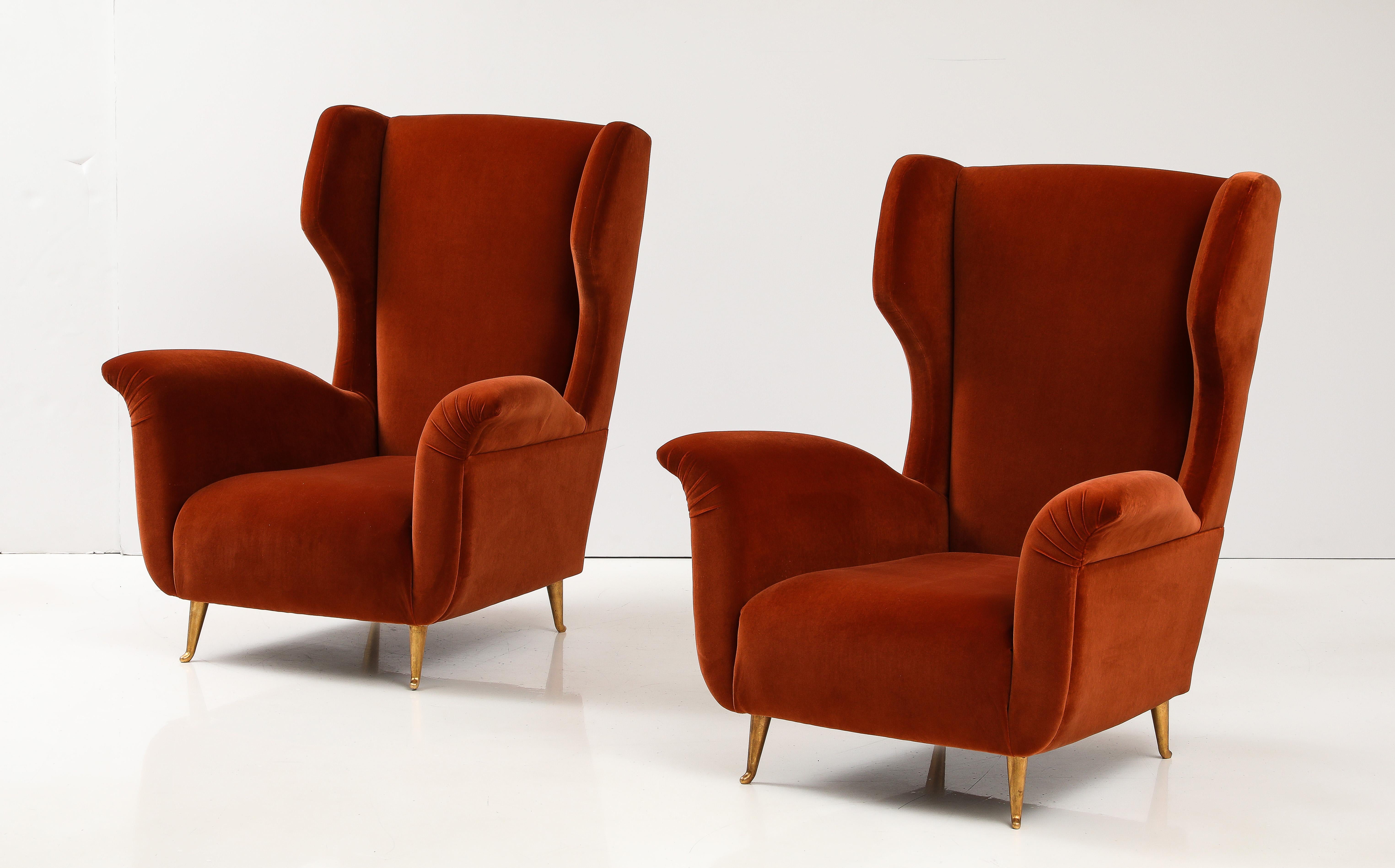 Pair of Custom Made Sculptural Lounge Chairs in Burnt Orange Red Velvet, Italy. Iconic Italian mid-century design, this pair of sculptural lounge chairs are newly handcrafted by our expert artisan in Florence, Italy and reupholstered in a soft and